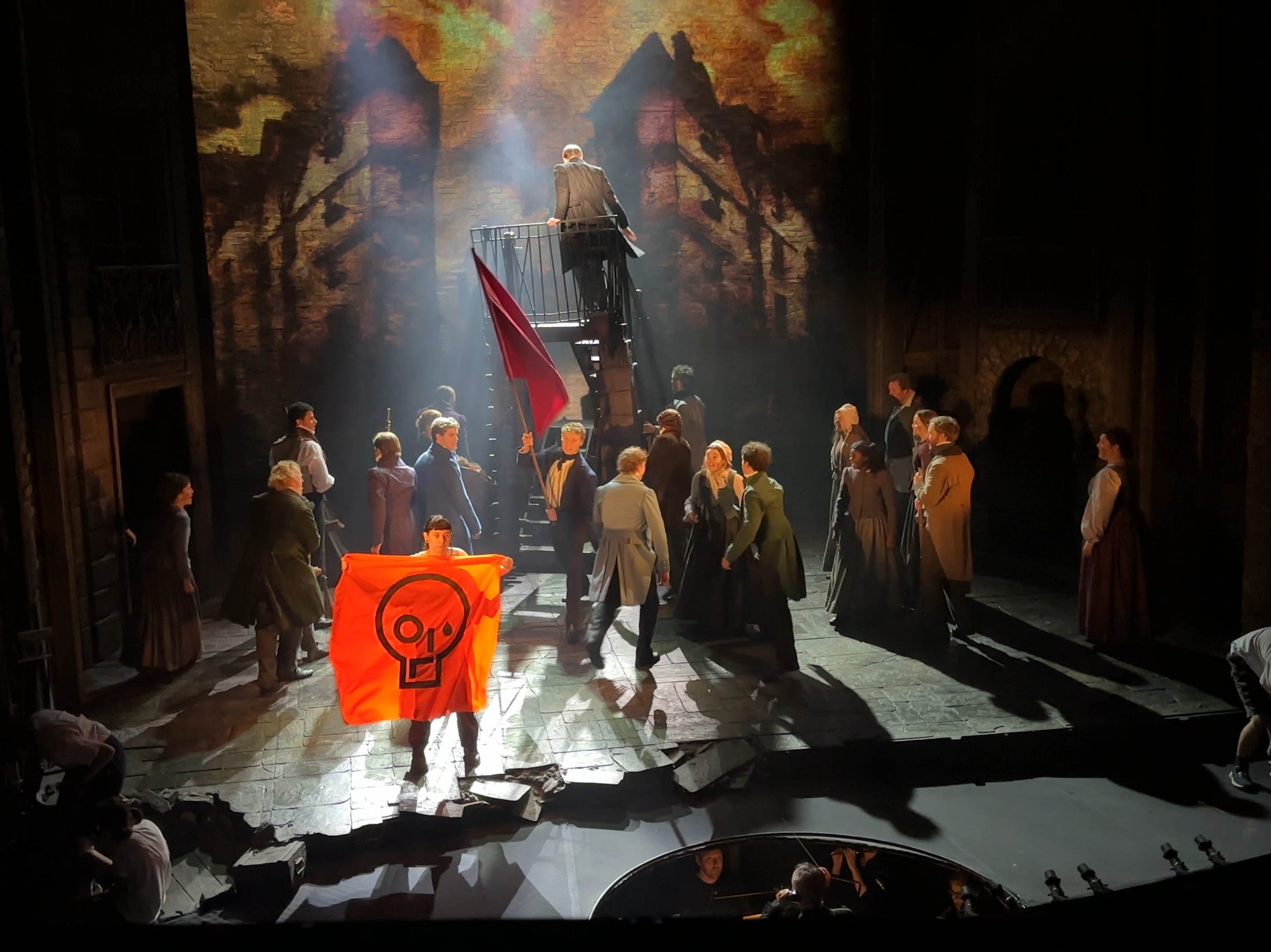 Just Stop Oil of activists disrupting a performance of Les Miserables at the Sondheim Theatre