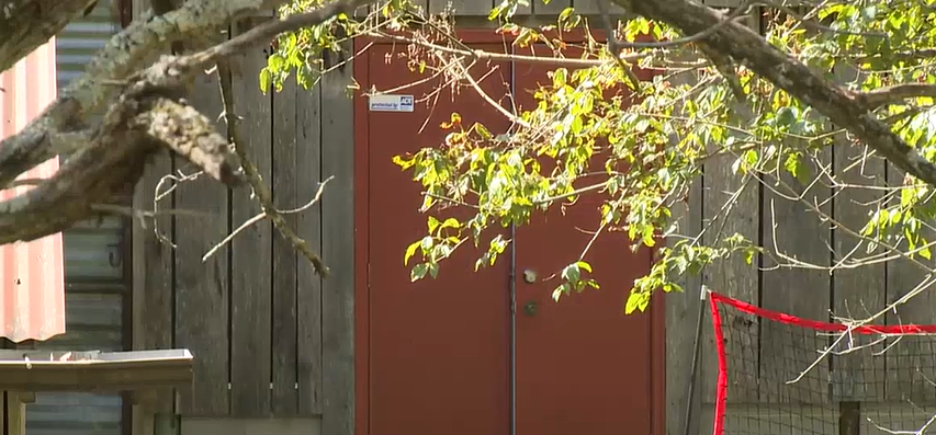 Two teens were found in dirty clothes locked up in this barn on the parents’ propety