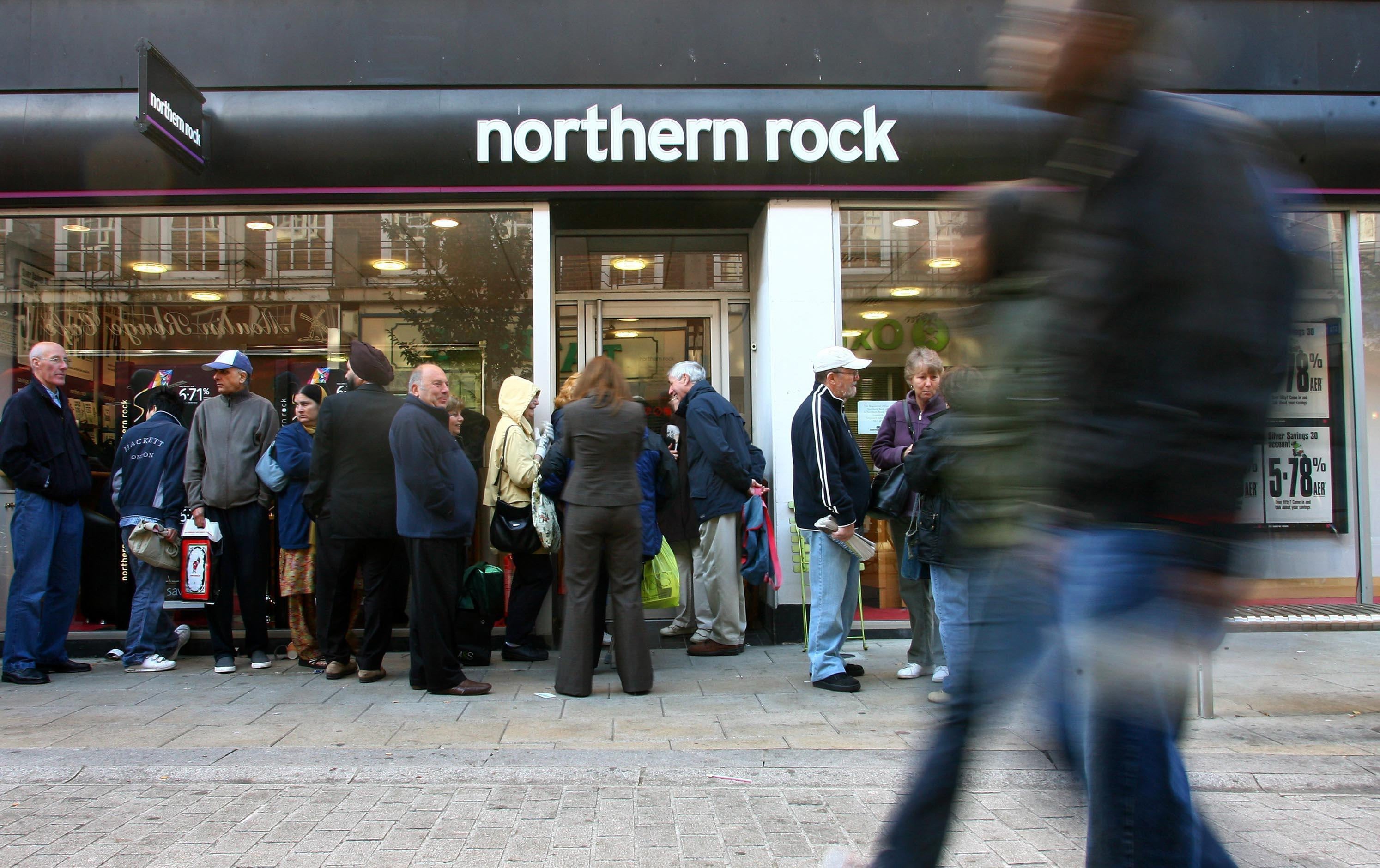 Customers queue to withdraw money from the Northern Rock Bank in Kingston-upon-Thames, Surrey, in 2007