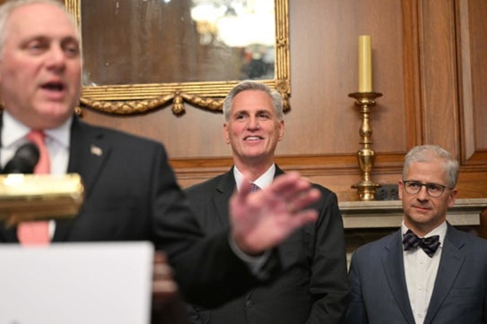 Republican debt limit negotiator Representative Patrick McHenry (R-SC) (R) and US House Speaker Kevin McCarthy (R-CA) listen to US House Majority Leader Steve Scalise