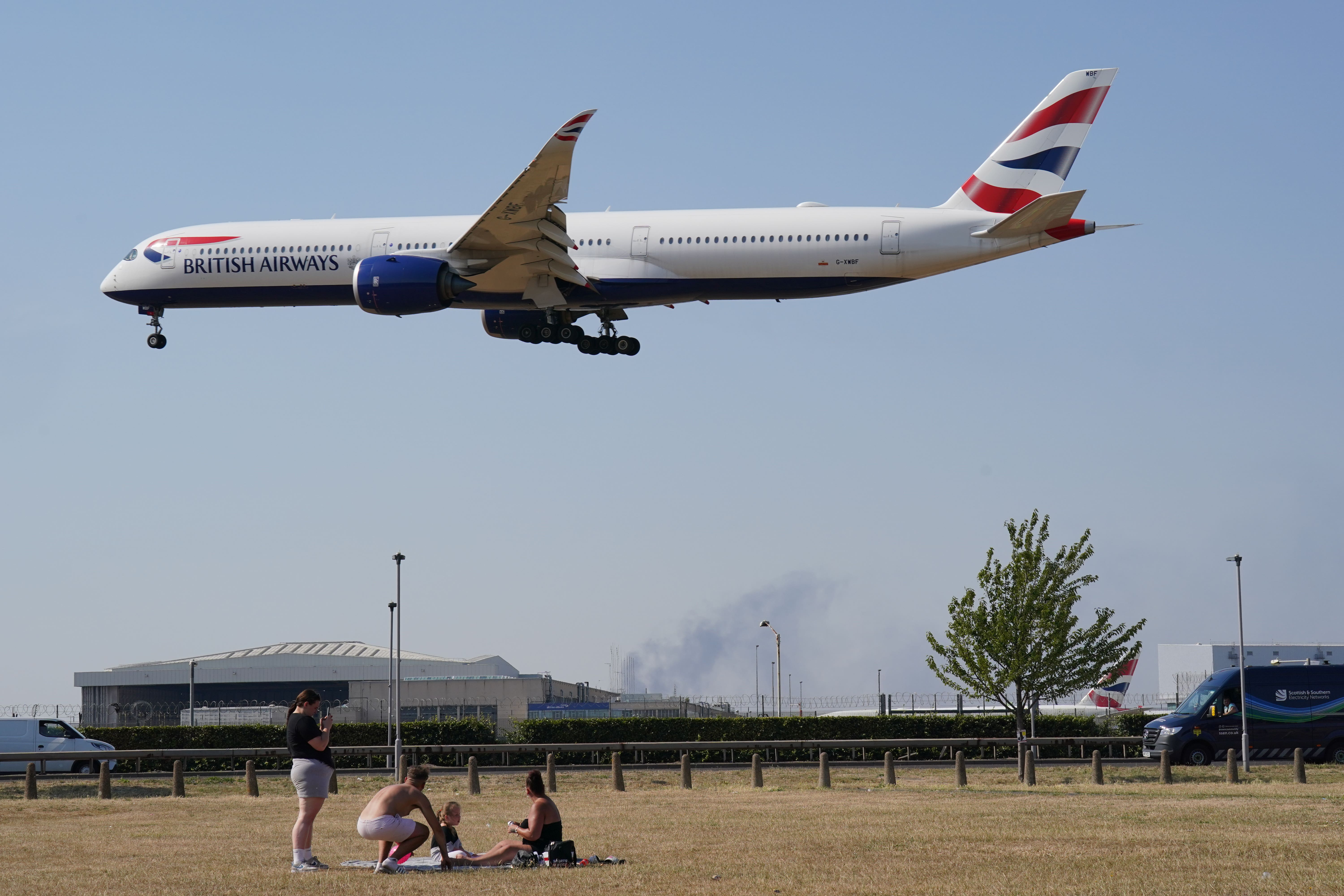 A British Airways flight coming into land at Heathrow Airport (Jonathan Brady/PA)