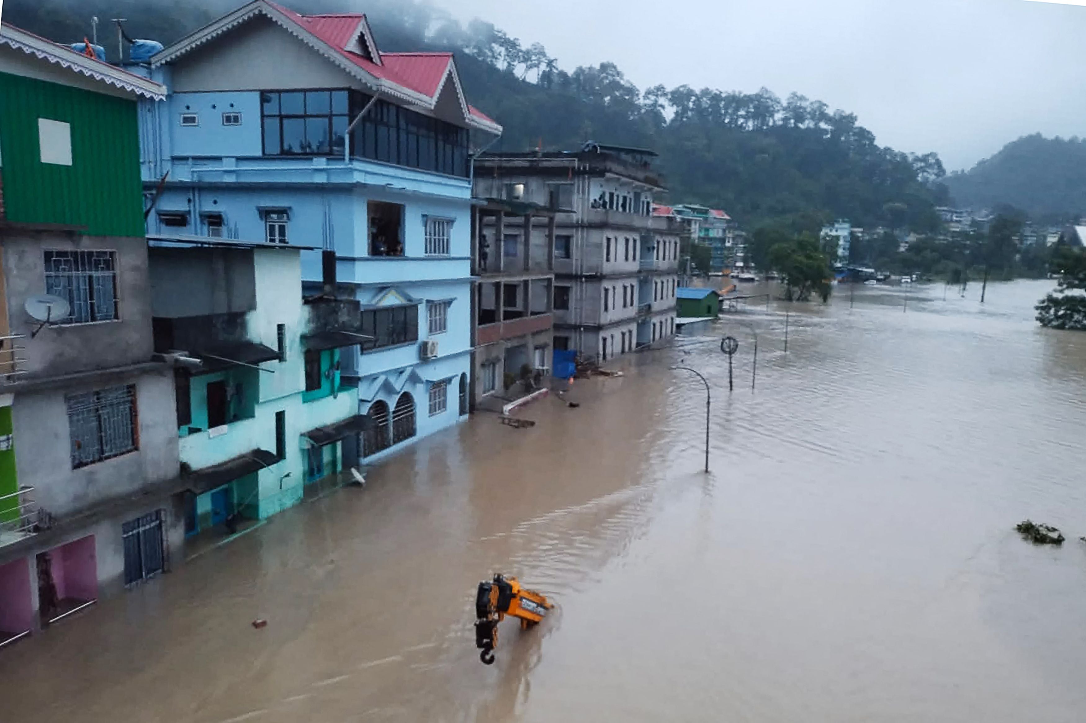 A flooded street in Lachen Valley