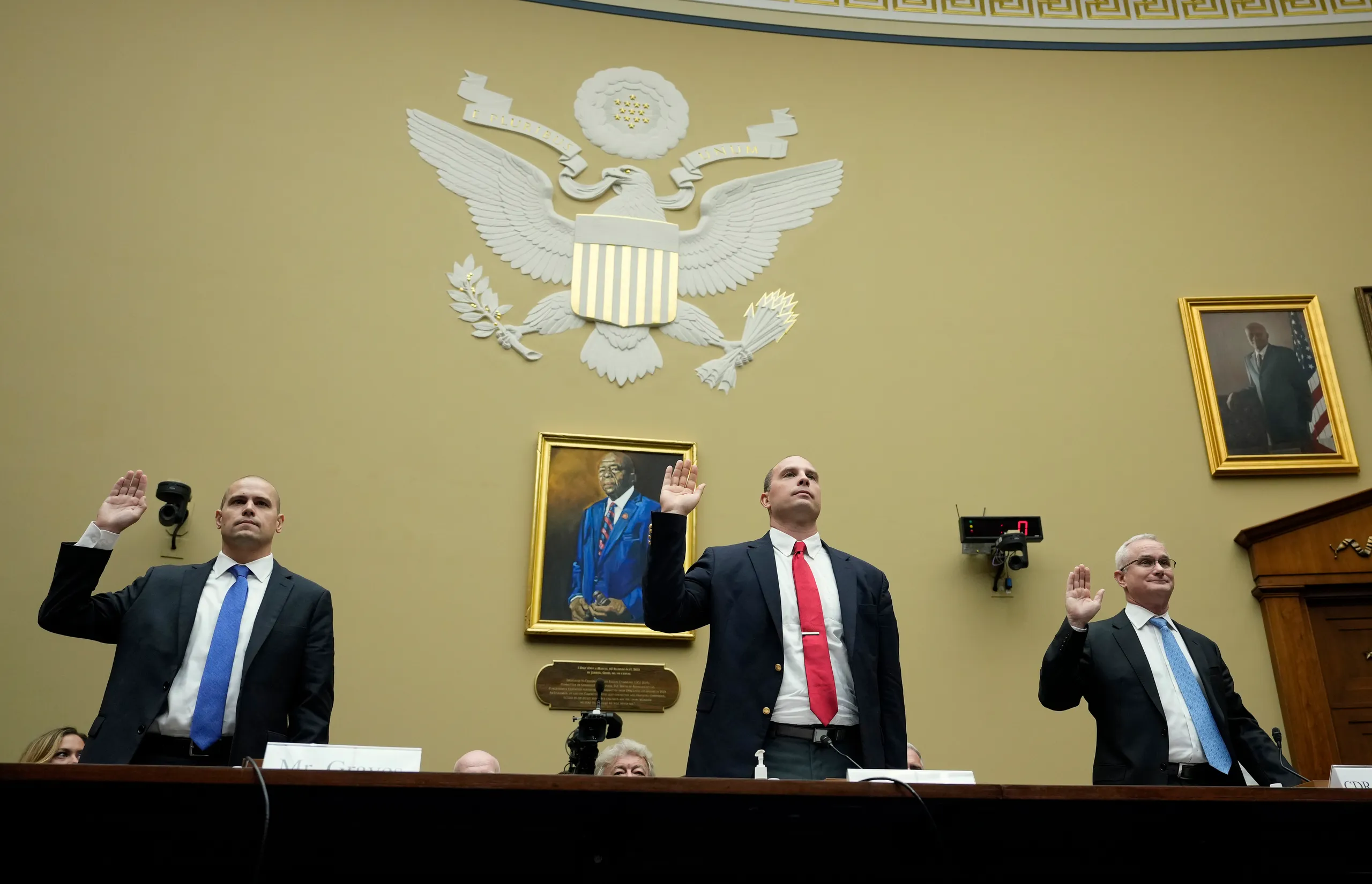 Ryan Graves, David Grusch and David Fravor are sworn in during a House Oversight Committee hearing