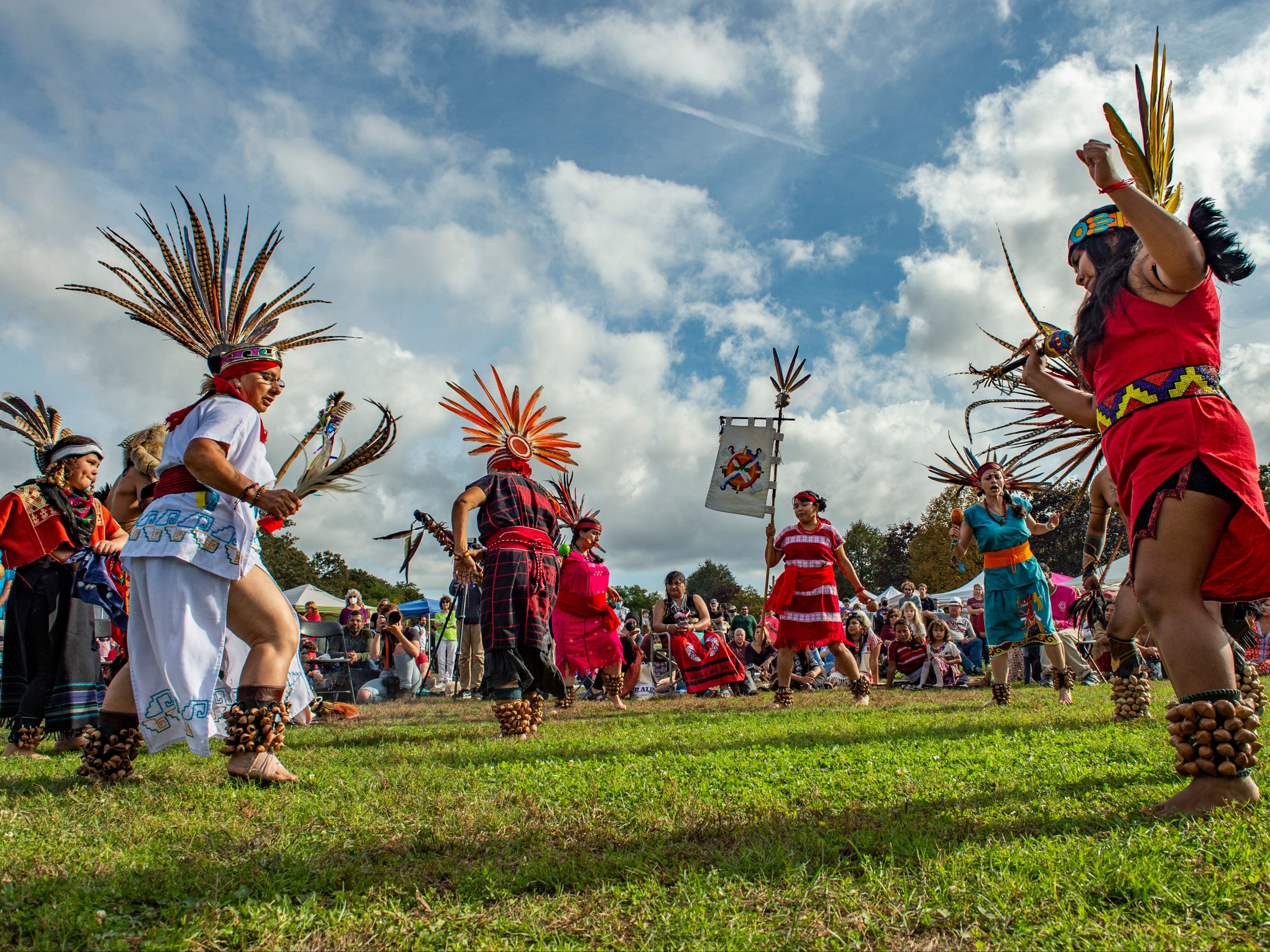 Members of Cetiliztli Nauhcampa perform traditional dances at the first Annual Indigenous Peoples' Day Ceremonial Celebration in Newton, Massachusetts on October 11, 2021