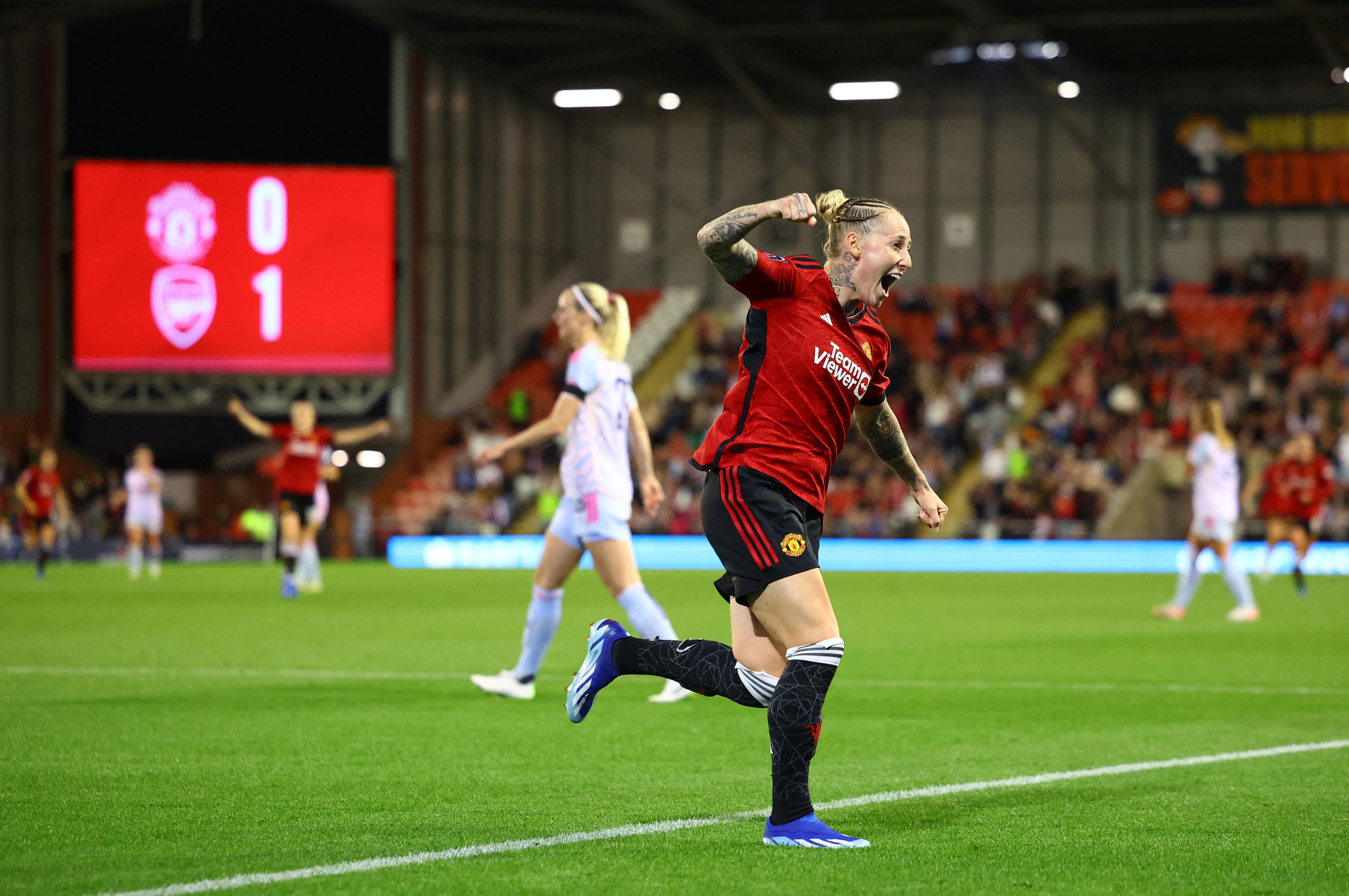 Leah Galton celebrates scoring the equaliser