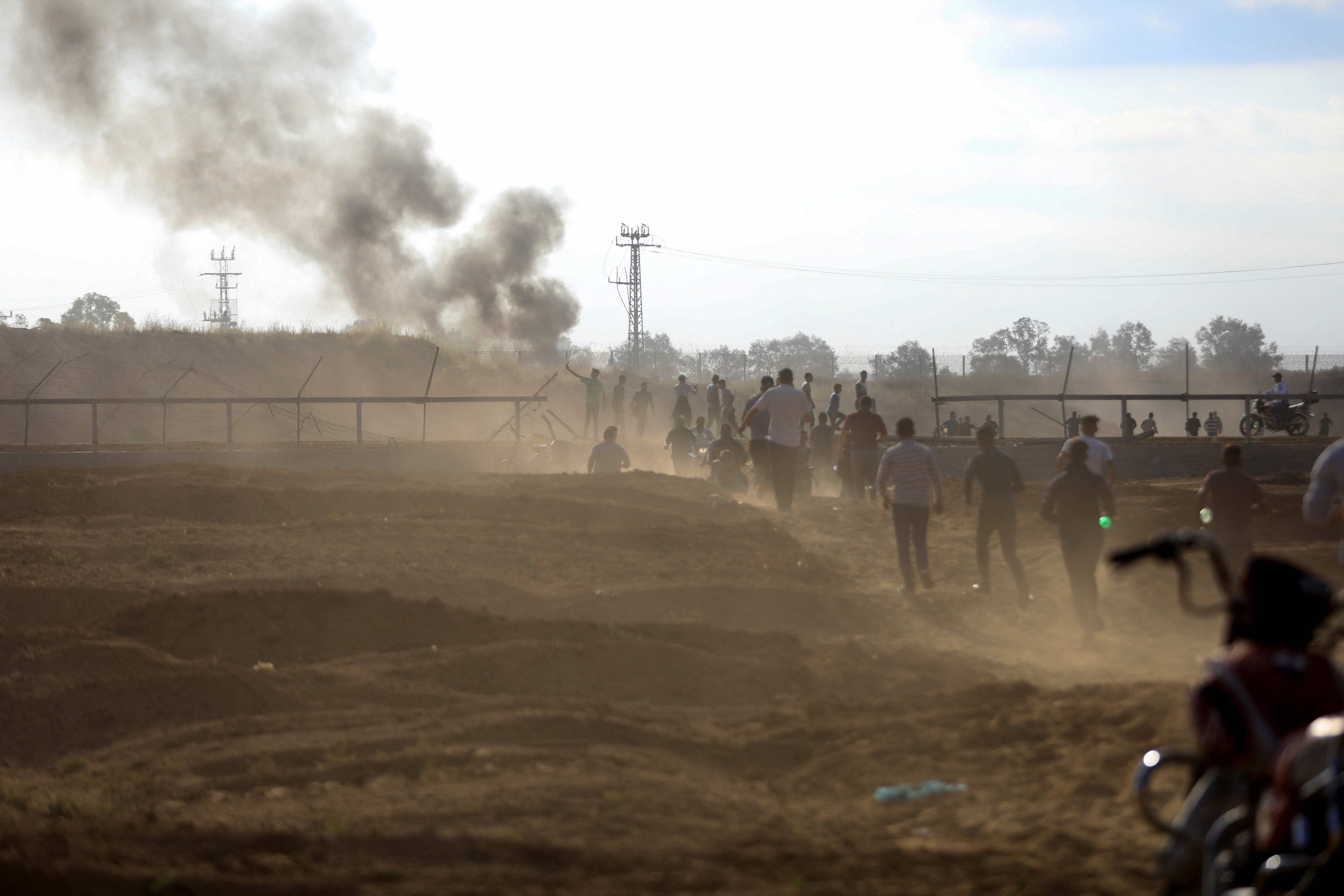 Palestinians broke into the Israeli side of Israel-Gaza border fence after Palestinian gunmen infiltrated areas of southern Israel