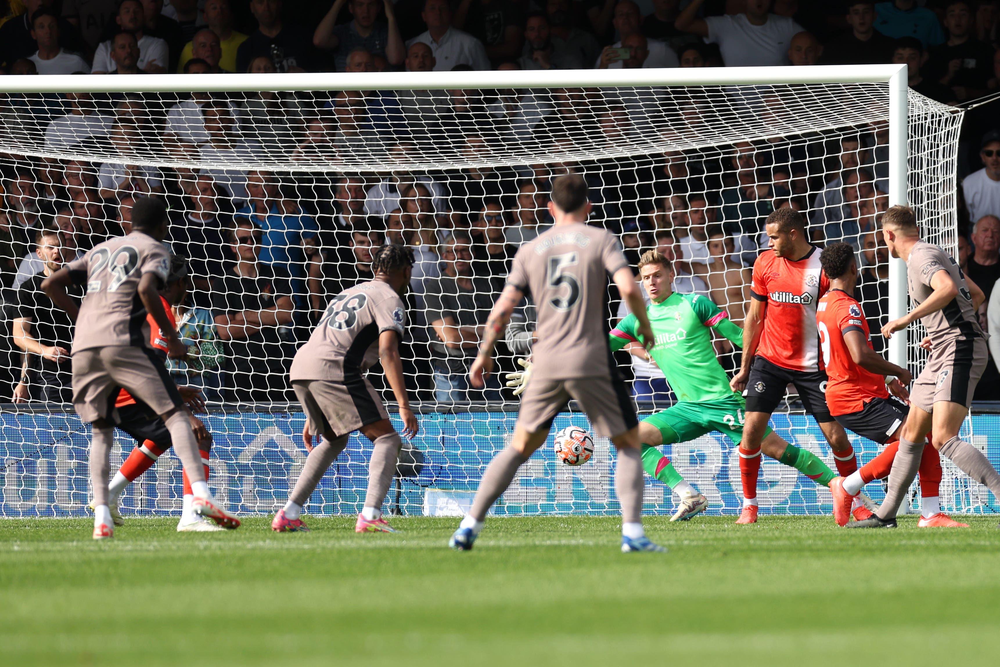 Micky van de Ven (right) scores the winner for Tottenham at Luton (Bradley Collyer/PA)