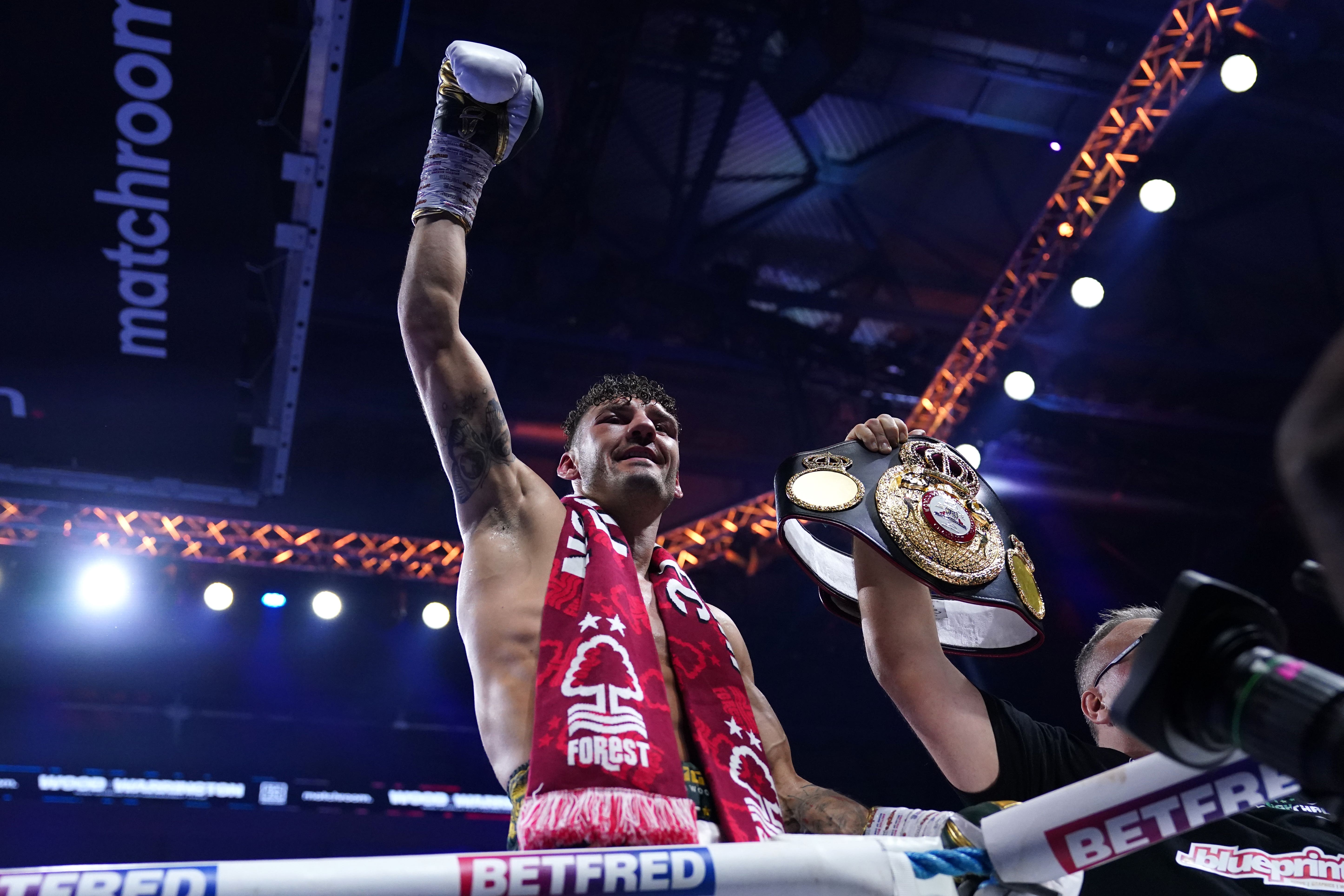 Leigh Wood celebrates victory against Josh Warrington in their WBA featherweight world title contest at Utilita Arena Sheffield (Nick Potts/PA)