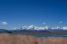 American mountaineer, local guide dead after avalanches hit Tibetan mountain. Two others are missing