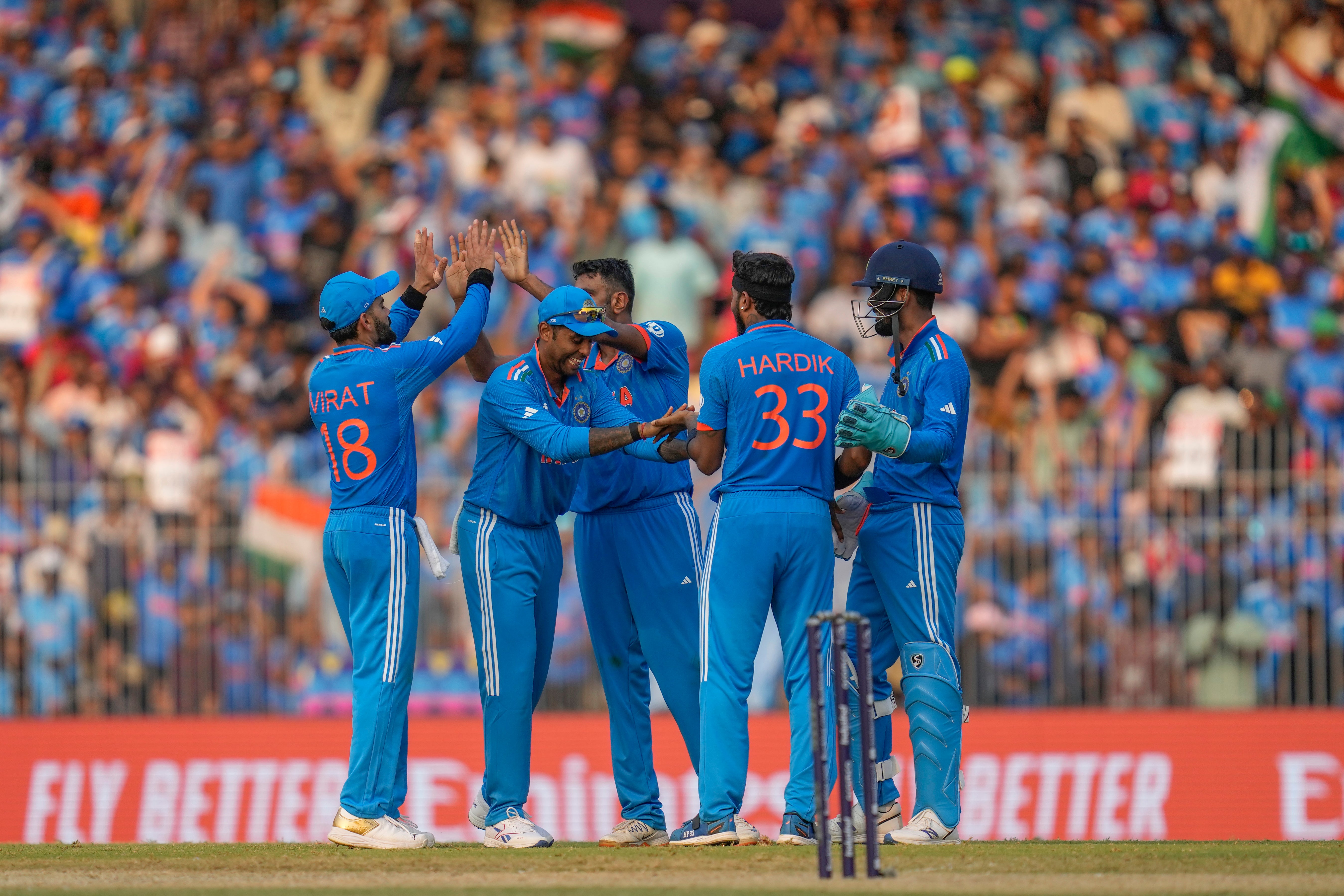 Indian players celebrate the dismissal of Australia's Cameron Green