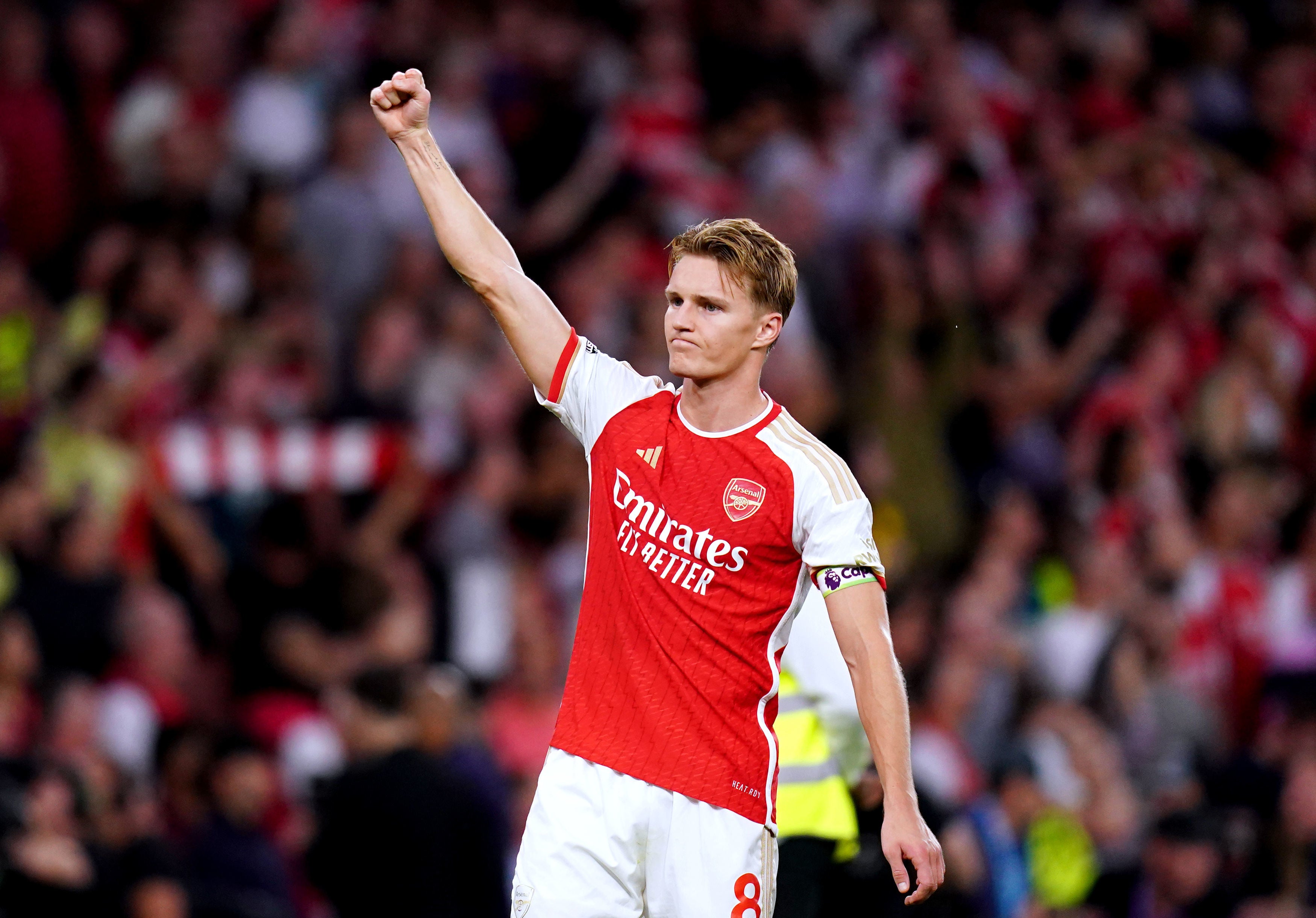 Martin Odegaard celebrated Arsenal’s victory at the final whistle