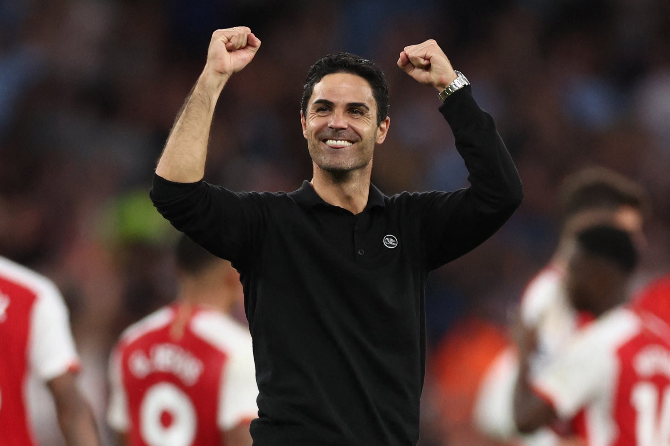 Mikel Arteta celebrates after Arsenal clinch a late victory against City