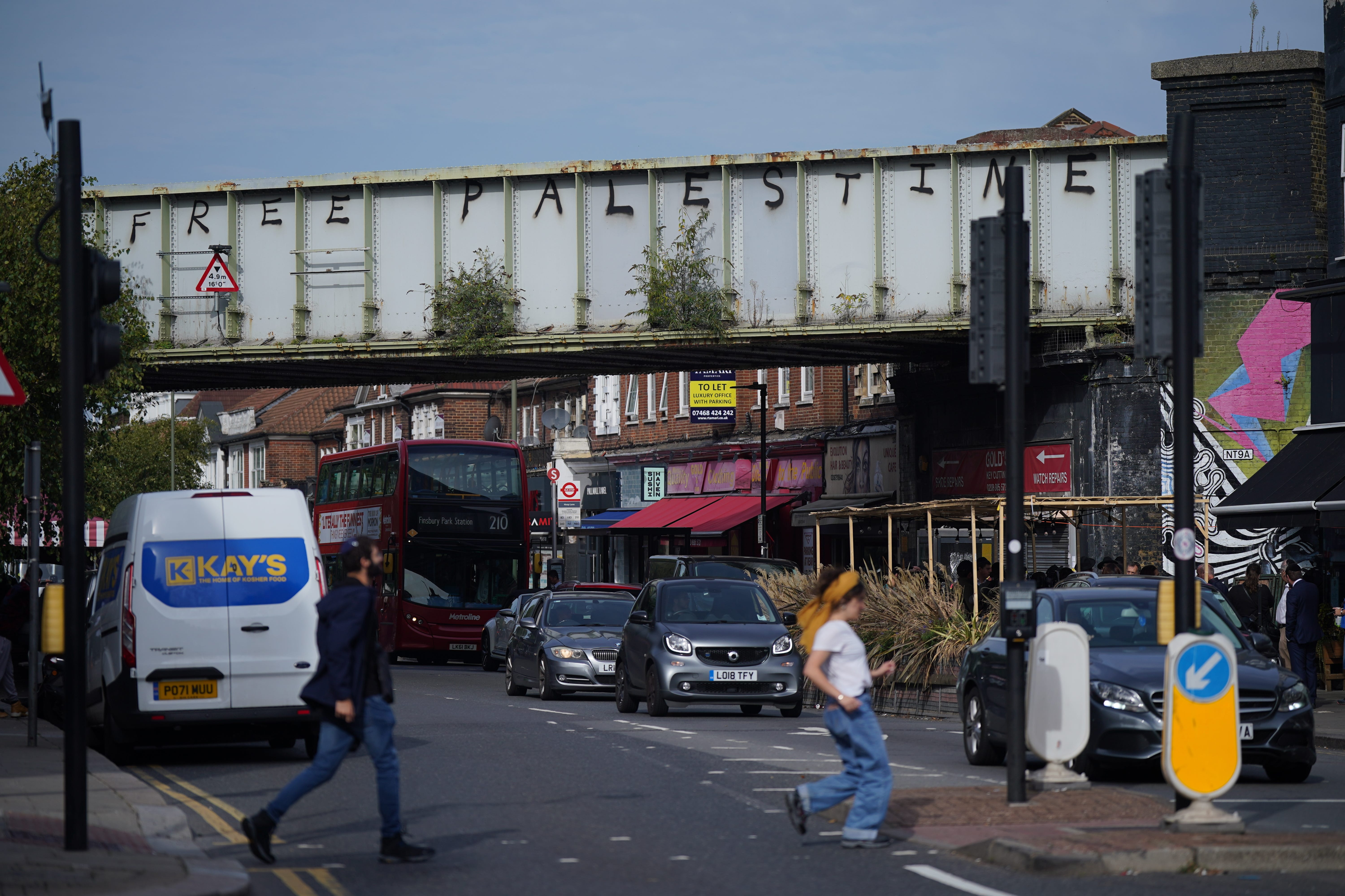 Pro-Palestinian graffiti was sprayed on a railway bridge in Golders Green, north London, an area with a prominent Jewish population