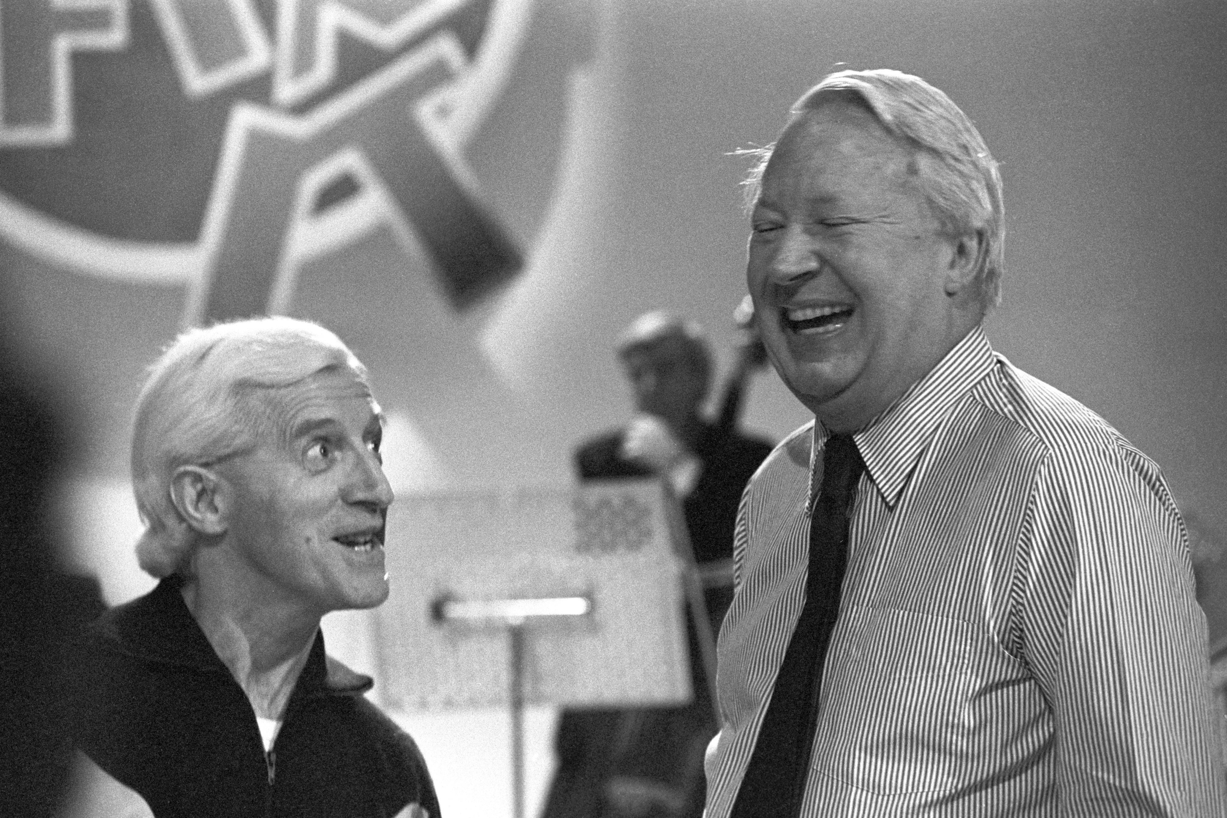 Former prime minister Edward Heath and Jimmy Savile rehearse for an episode of ‘Jim'll Fix It’