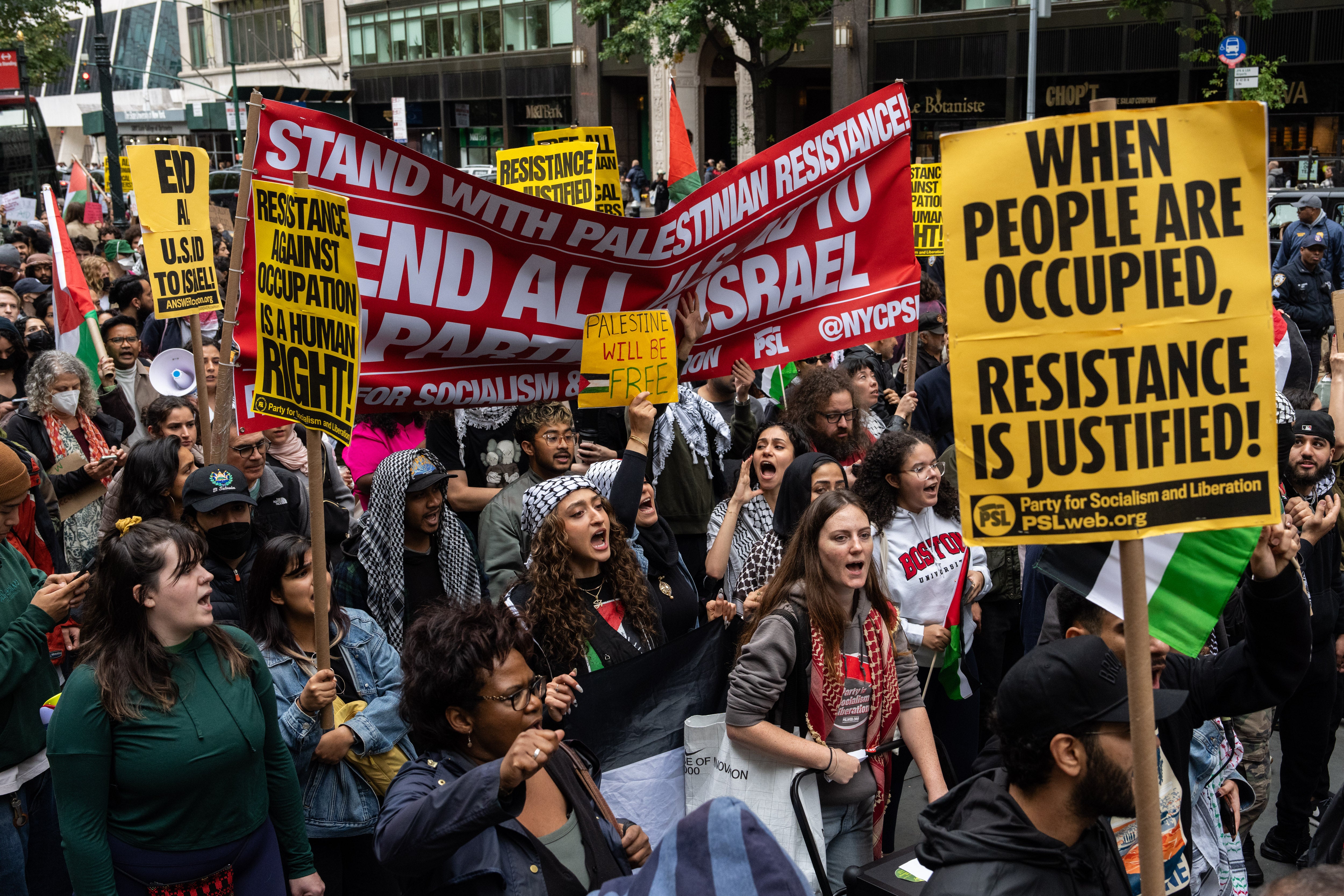 Demonstrators march in support of the Palestinian people