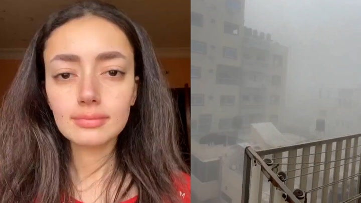Alaqad films herself sheltering as bombs drop outside window