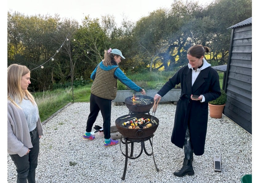 The fire pit supper is a cut above, with steak and lobster tail