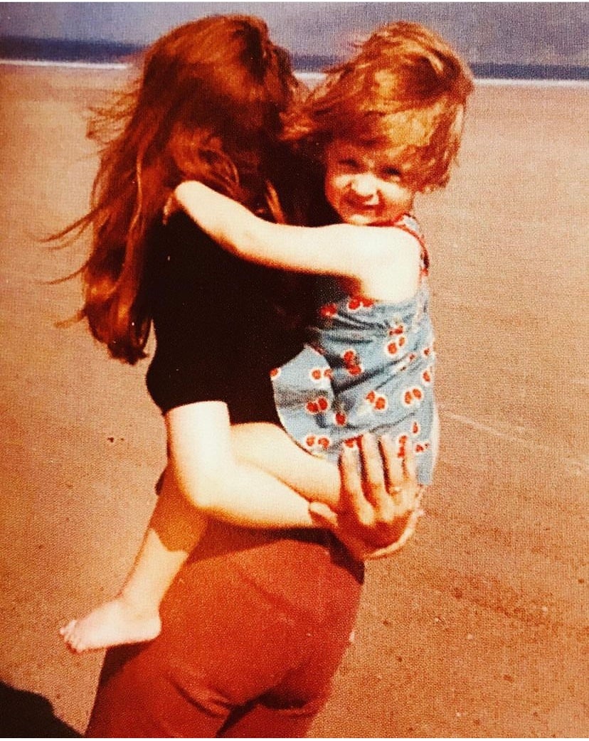 Sophie on the beach with her mum who, she says, brought her up to fight for a better world