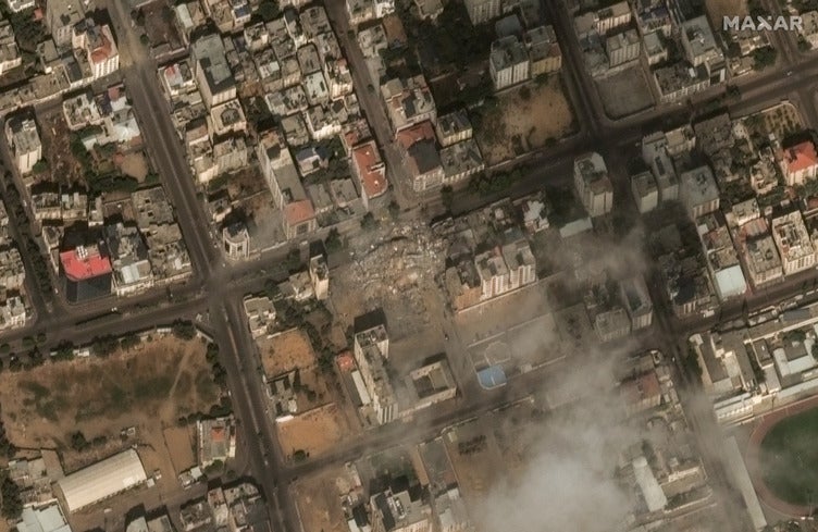 Smoke rises above Watan Tower after it was destroyed in an aerial bombardment