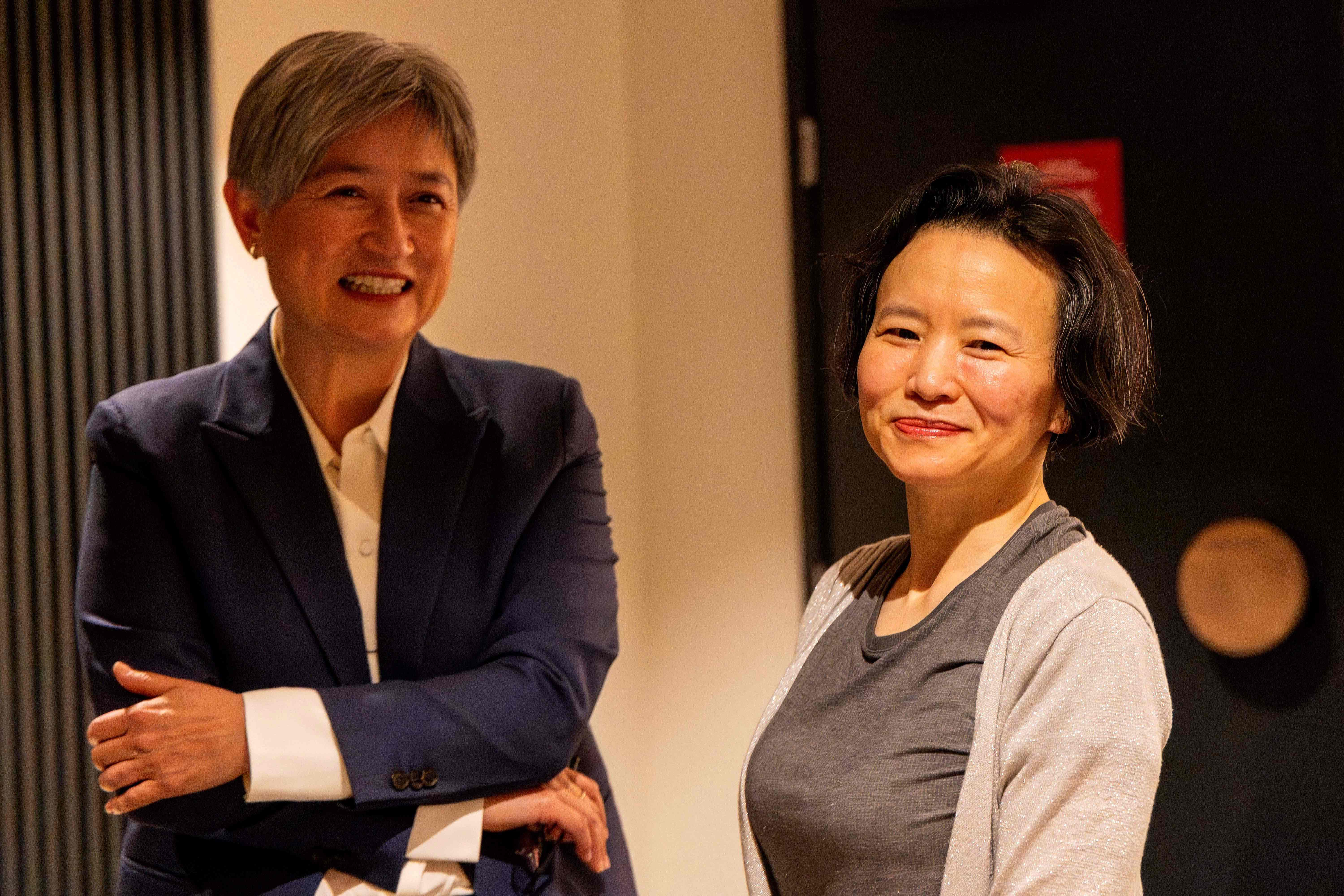 Australian foreign minister Penny Wong speaking with journalist Cheng Lei upon her arrival at the airport in Melbourne