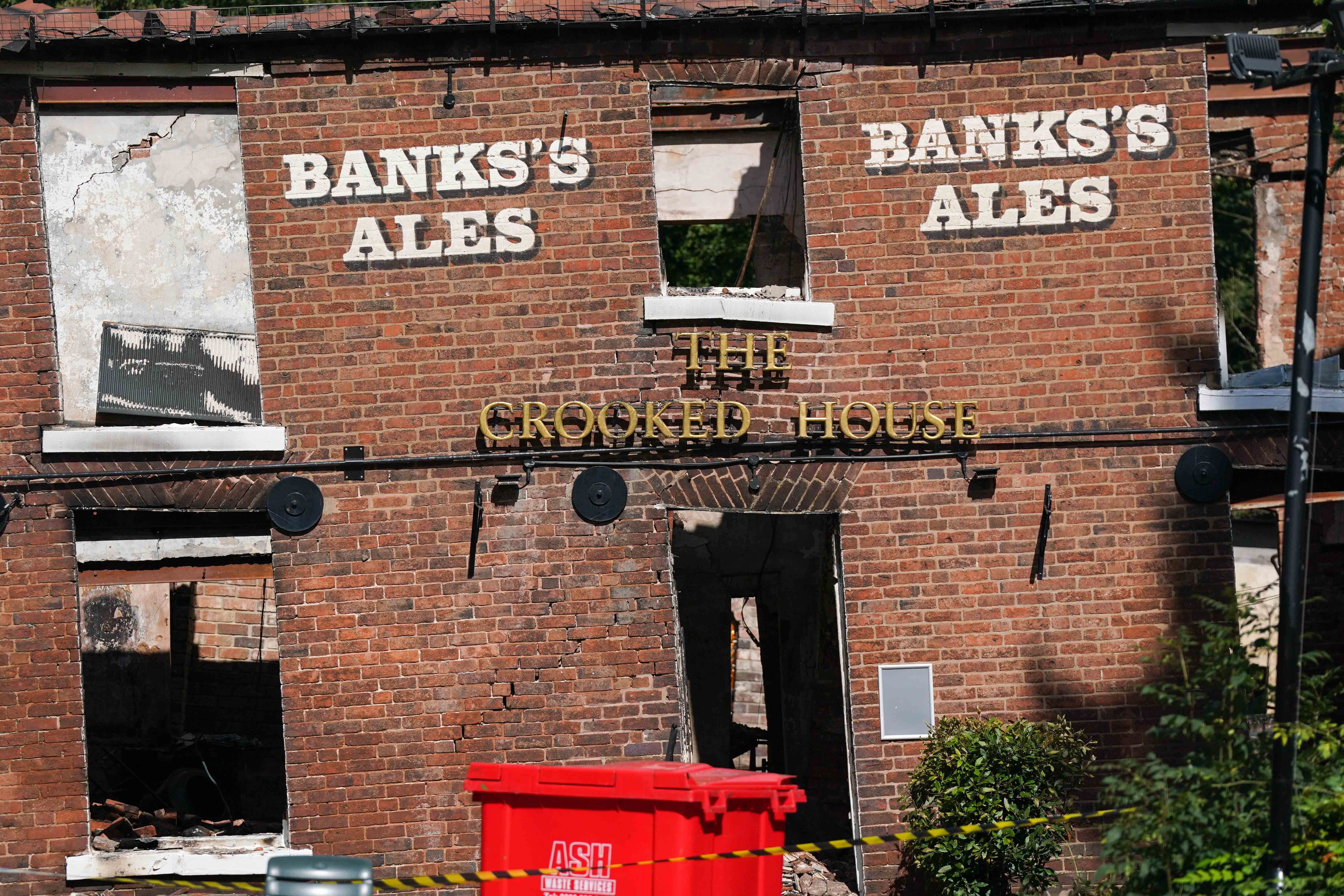 The burnt out remains of The Crooked House pub near Dudley, in August (Jacob King/PA)