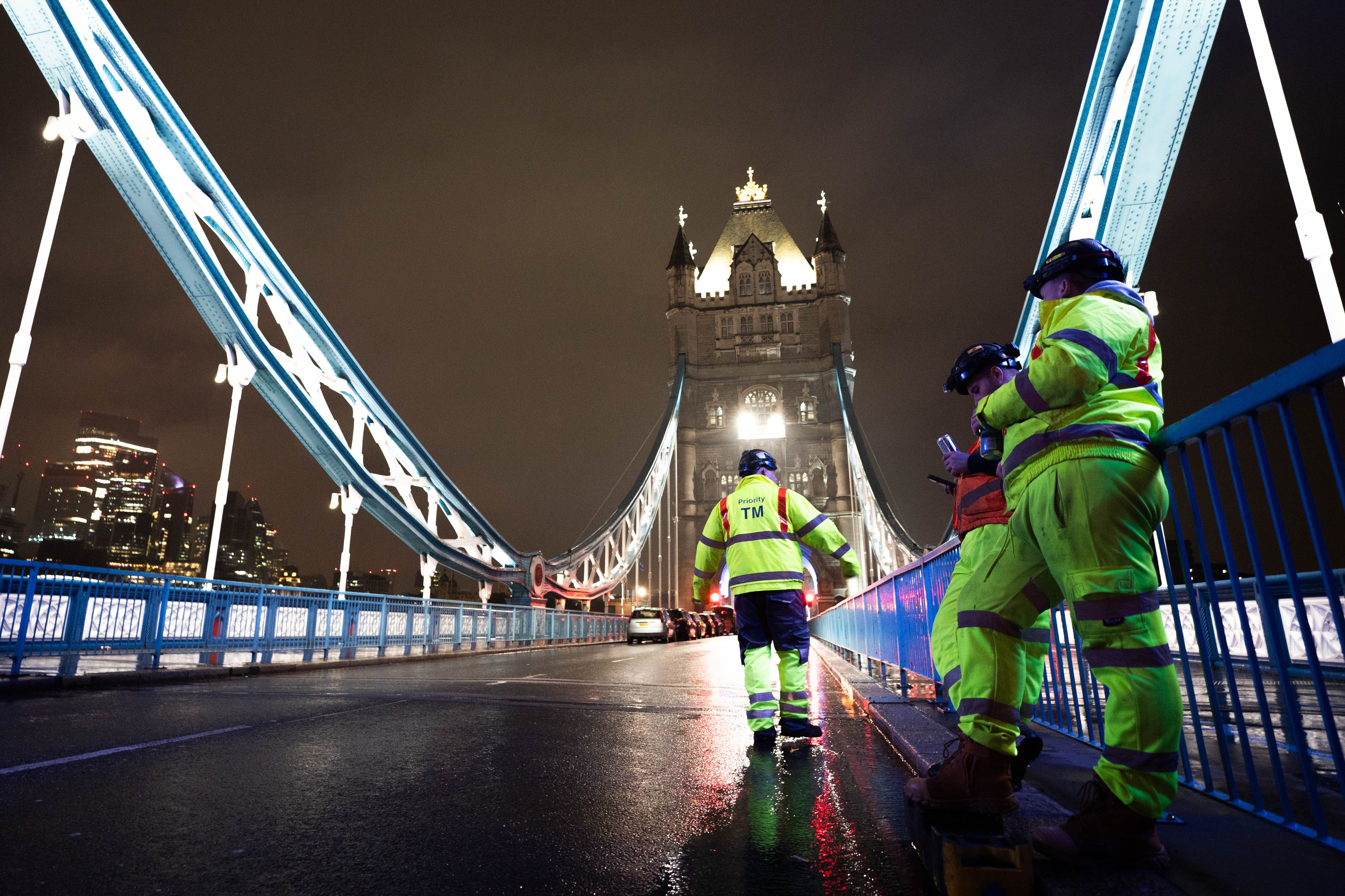 Engineers work at Tower Bridge in central London (James Manning/PA)