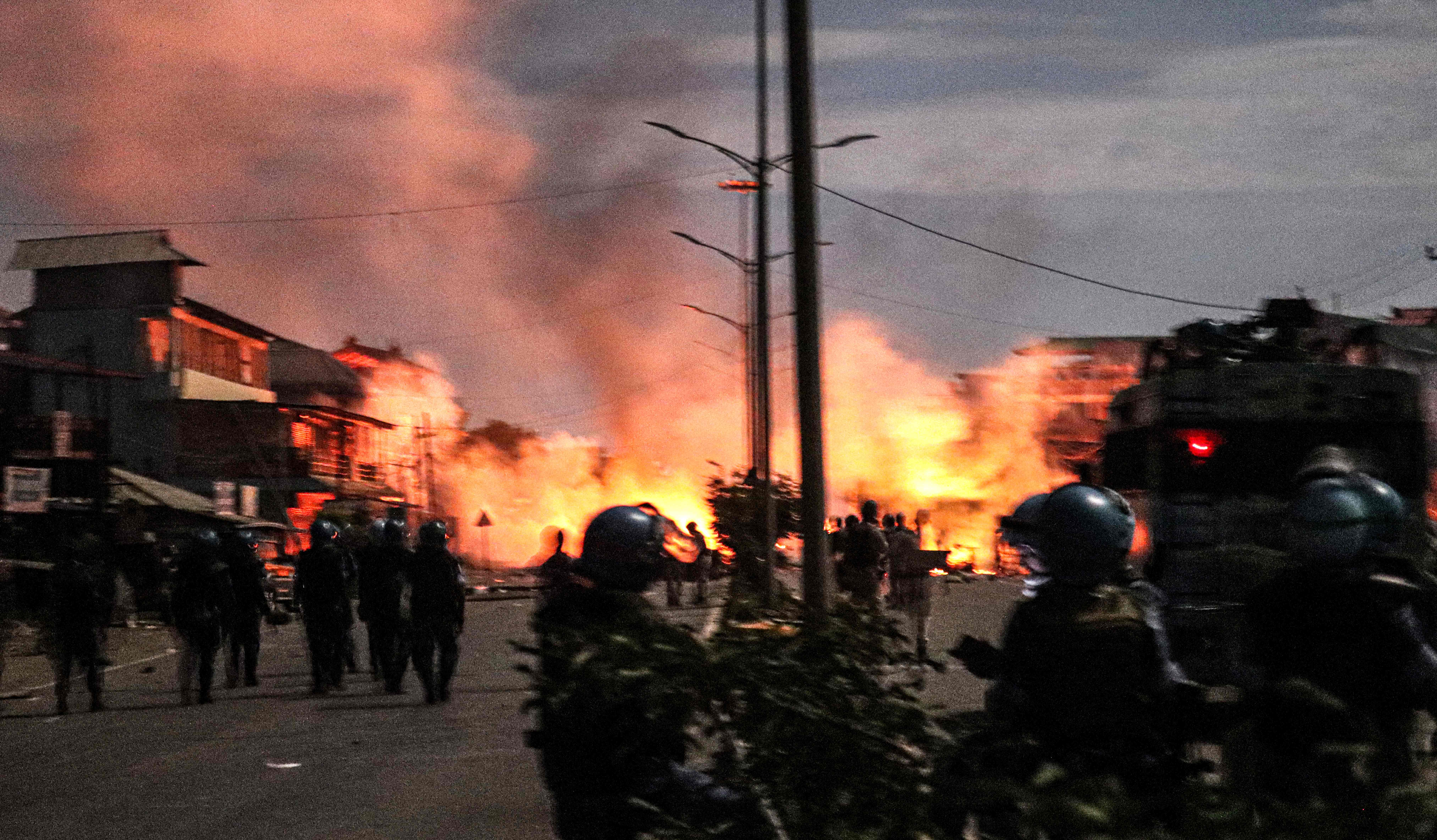 Demonstrators burn tyres as they protest near the family home of chief minister N Biren Singh, in Imphal in India’s northeastern state of Manipur, amid ongoing ethnic violence