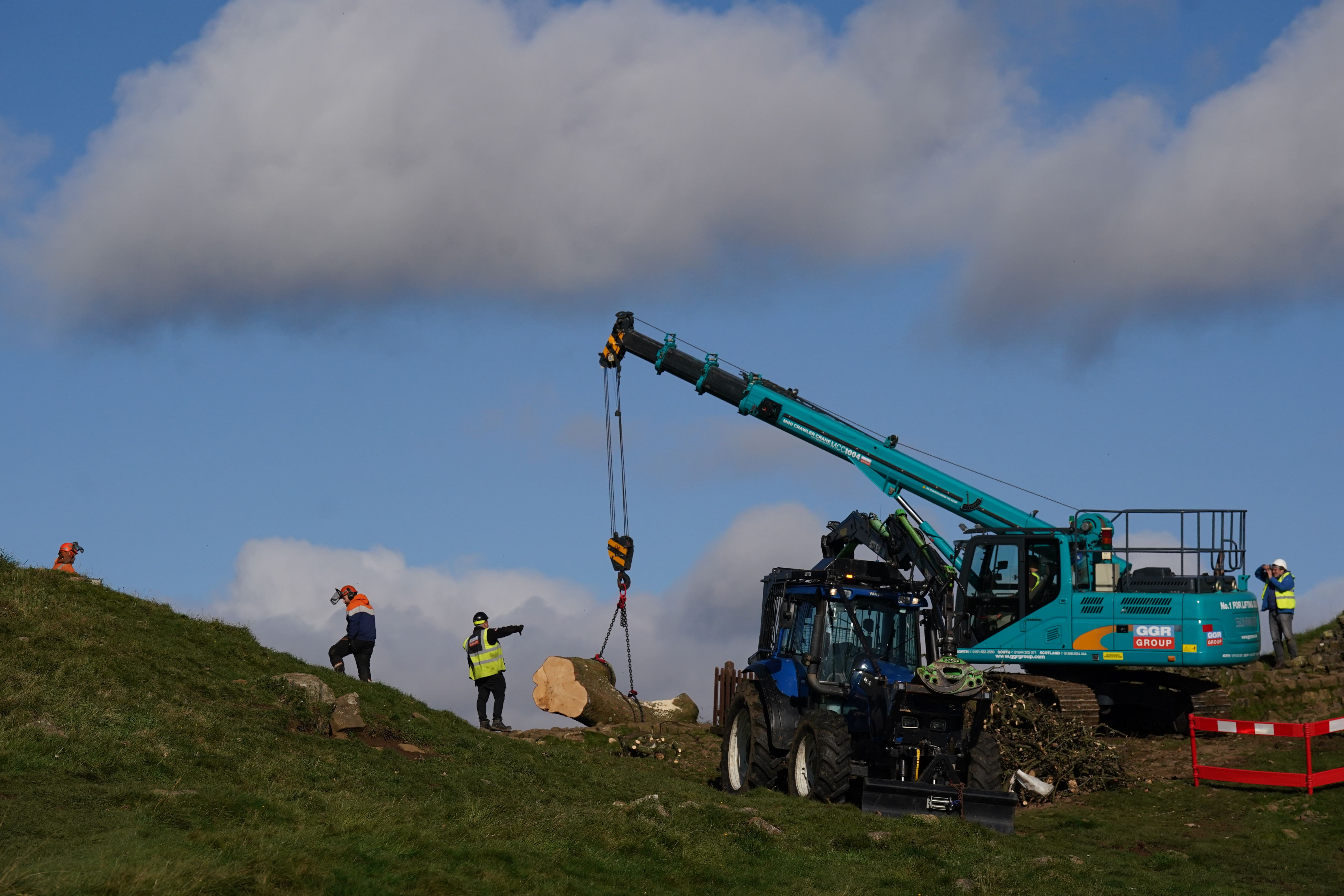 Sycamore Gap tree is finally lifted away after felling ‘prolonged its life’