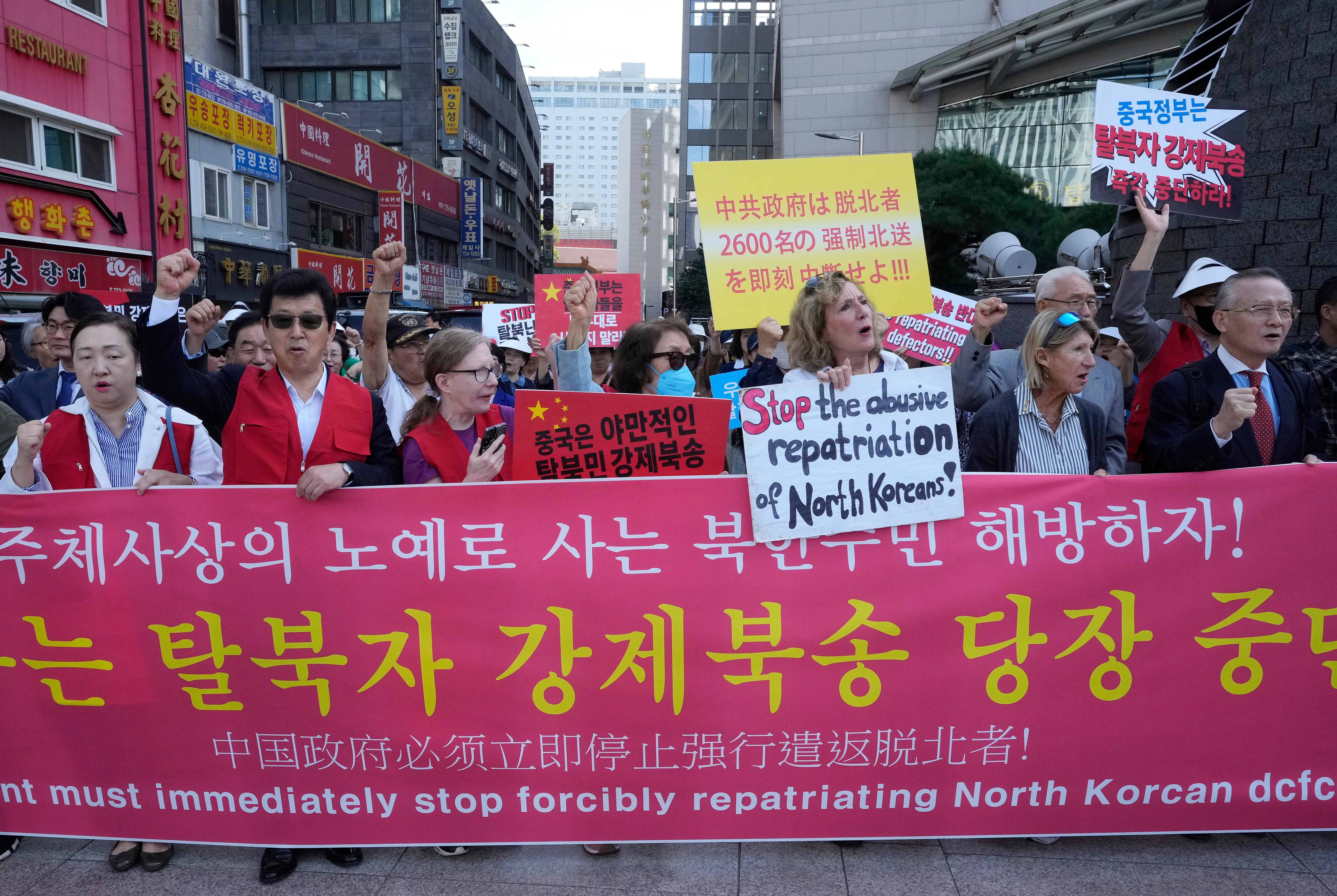 North Korean defectors and human rights activists stage a rally demanding that the Chinese government release North Korean defectors captured in China, near the Chinese Embassy in Seoul, in 2023