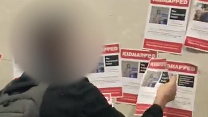 Posters of kidnapped Israelis stuck to wall outside BBC Broadcasting House