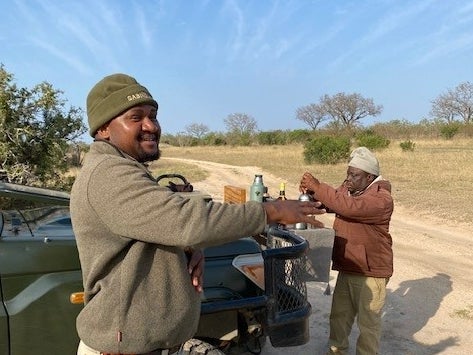 Game ranger Doc Themba guides guests to the best animal sightings