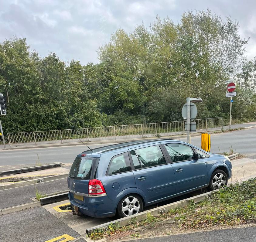 A car getting stuck in the bus lane trap at the junction of Station Road and Harrison Way in St Ives