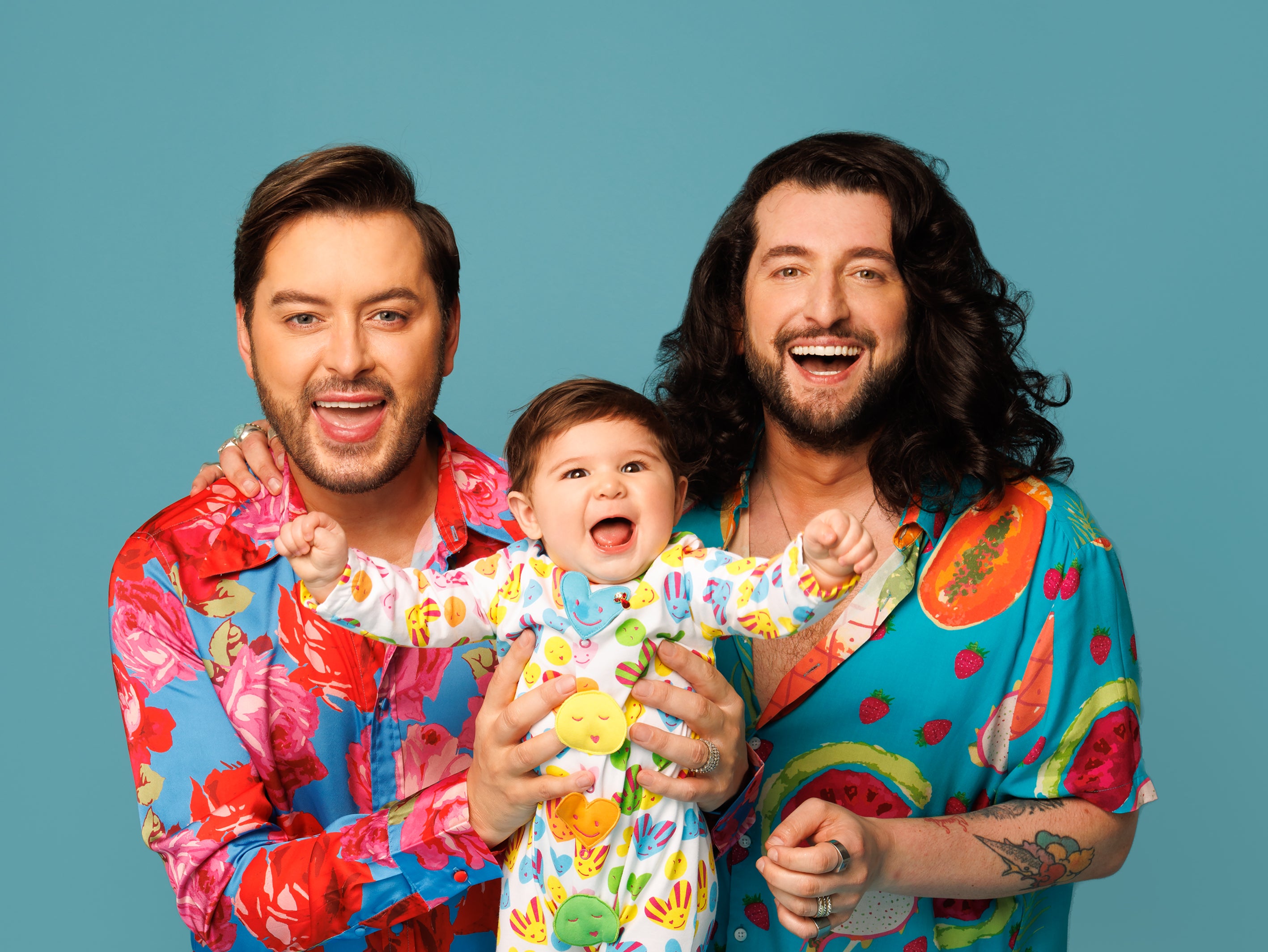 Brian with his husband Arthur and their daughter, Blake