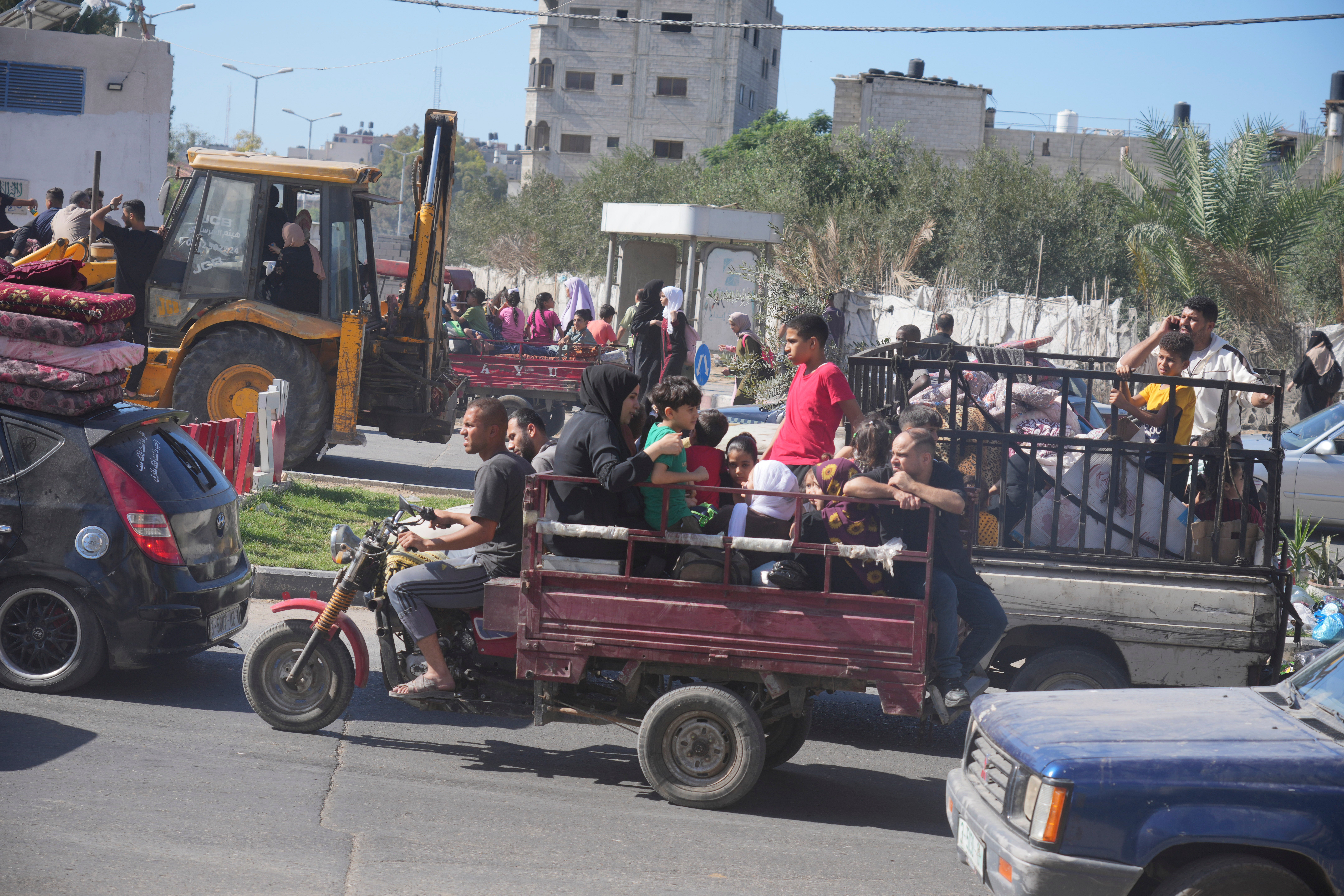 Palestinians flee to the southern Gaza Strip after the Israeli army issued an evacuation warning to a population of over 1 million in northern Gaza and Gaza City to seek refuge in the south ahead of a possible Israeli ground invasion, Friday, 13 Oct 2023