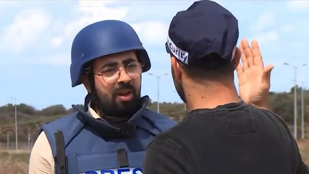 Watch: Israeli police officer threatens reporter live on air