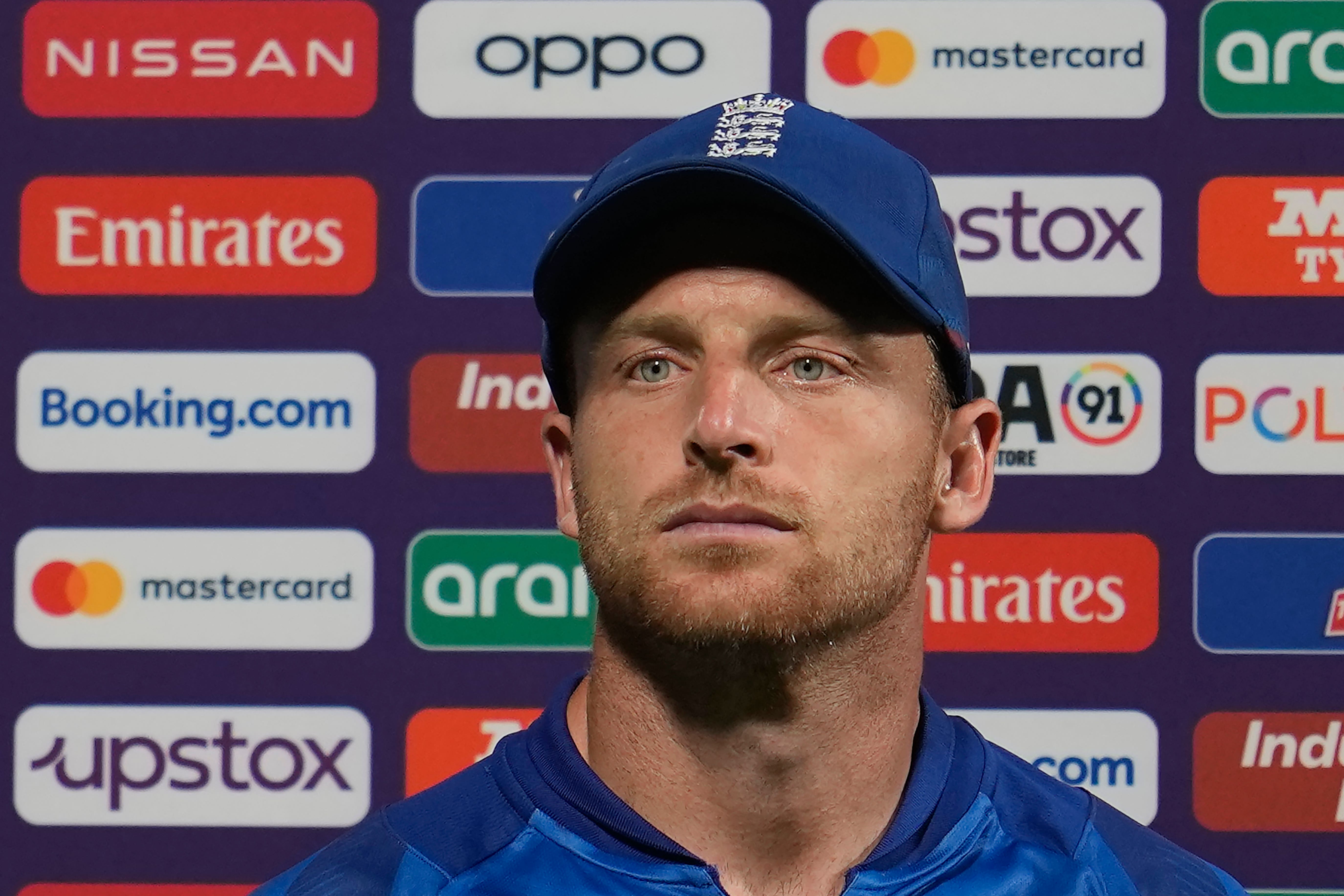 England captain Jos Buttler looked glum after their defeat by Afghanistan (Manish Swarup/AP)