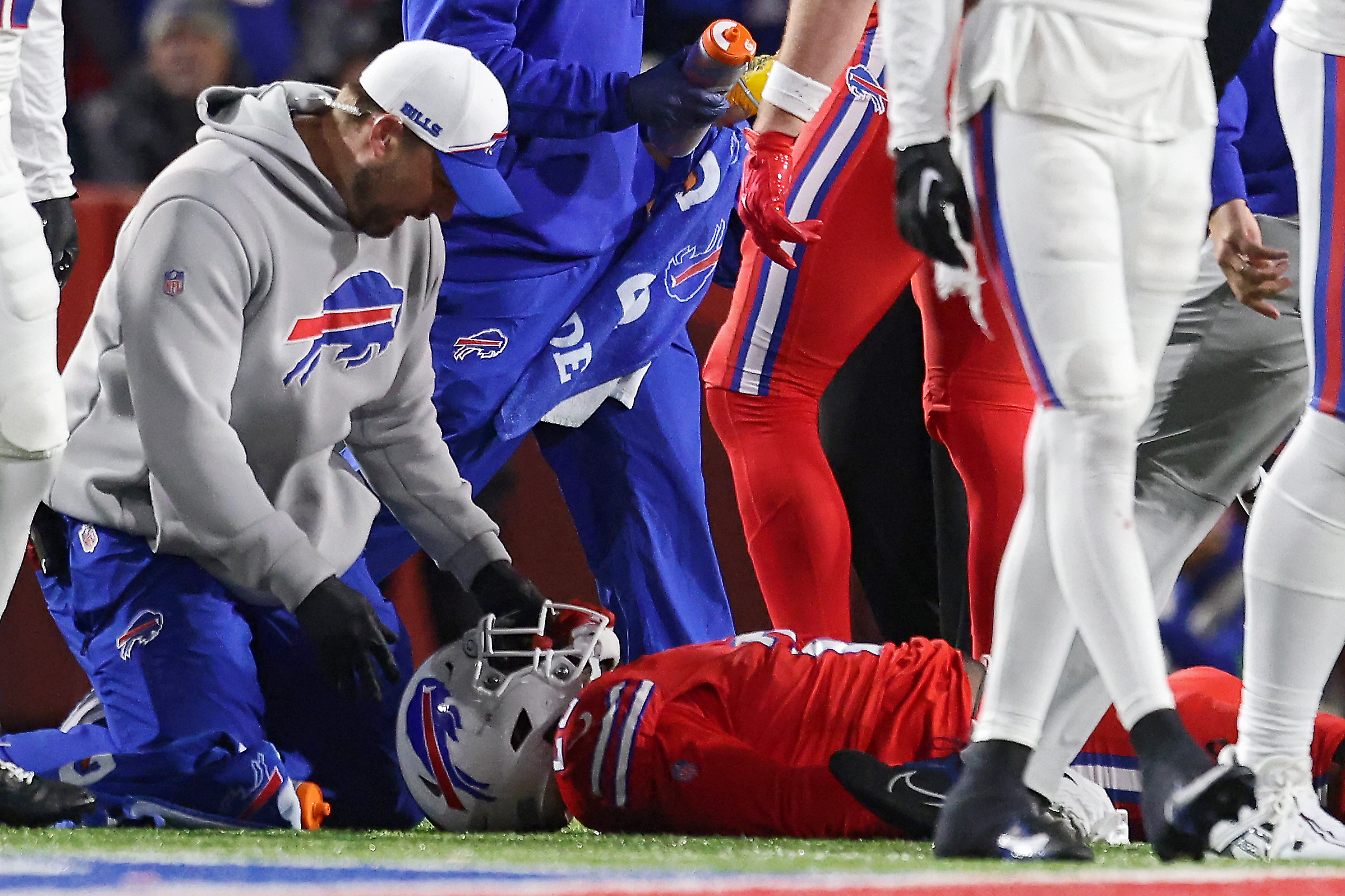 Damien Harris #22 of the Buffalo Bills is helped by athletic trainers before being taken away in an ambulance after an injury in the second quarter of a game against the New York Giants at Highmark Stadium on October 15, 2023 in Orchard Park, New York.