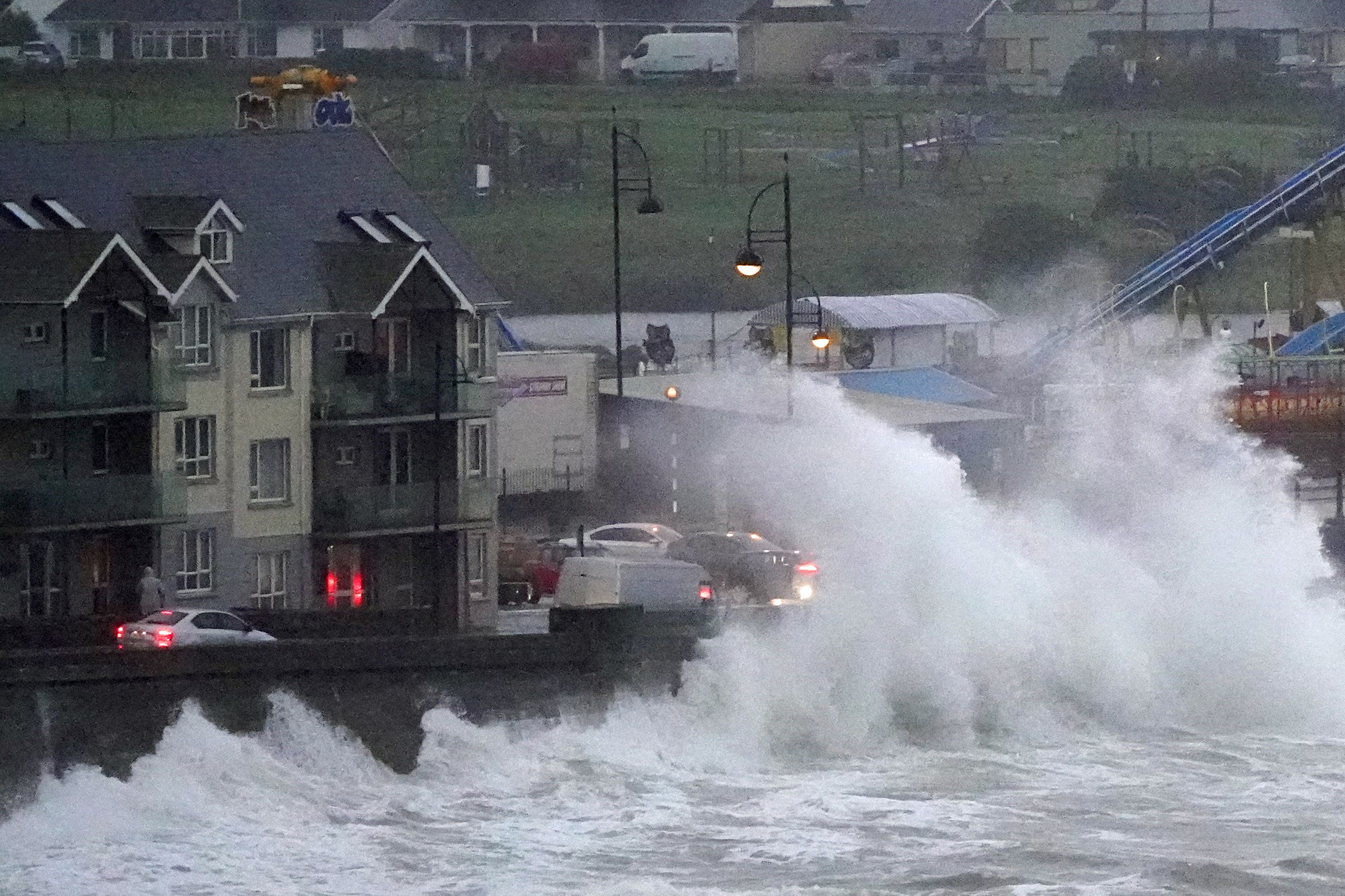 Waves crash against the sea wall in Tramore, County Waterford