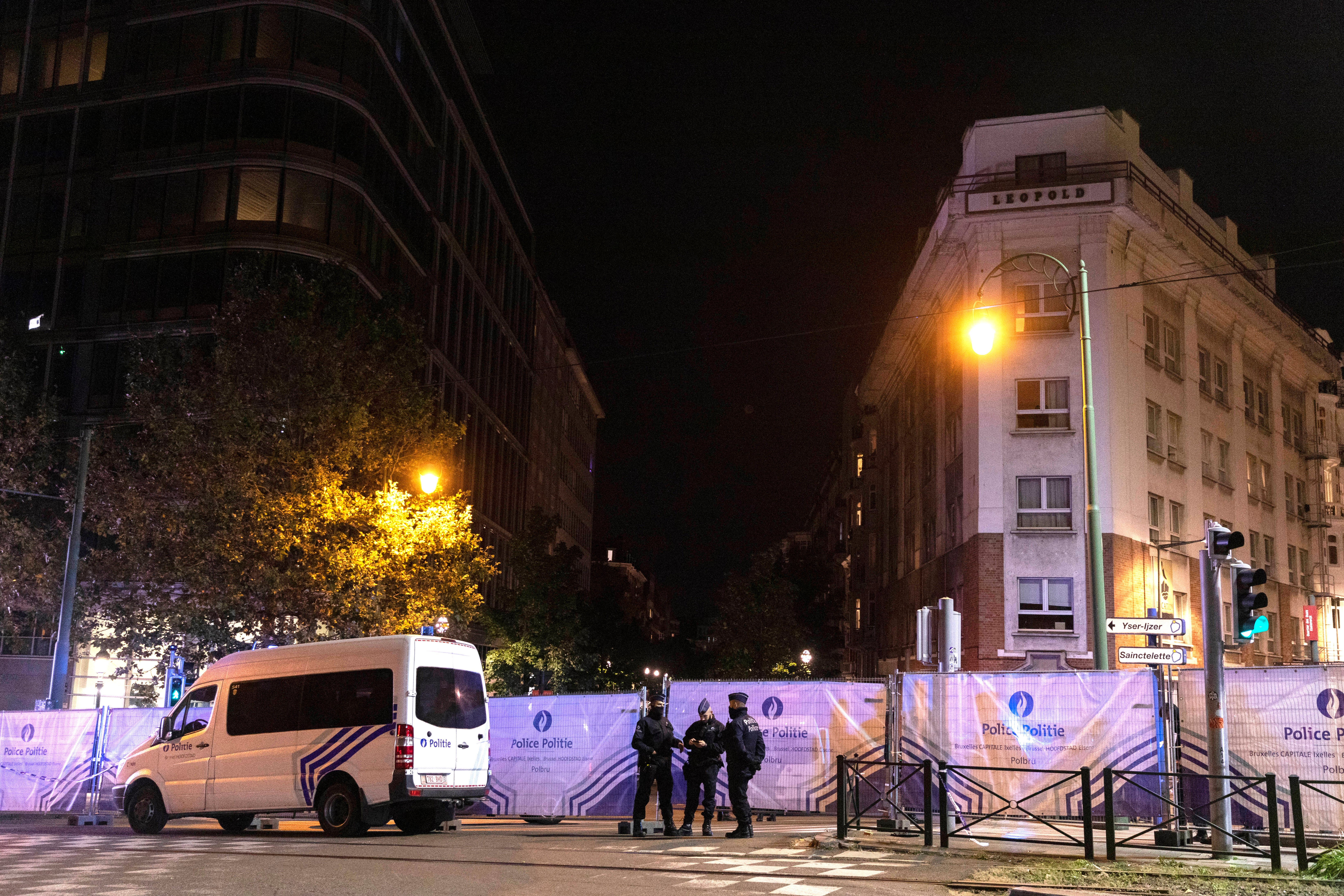 Police cordon off an area where a shooting took place in the center of Brussels