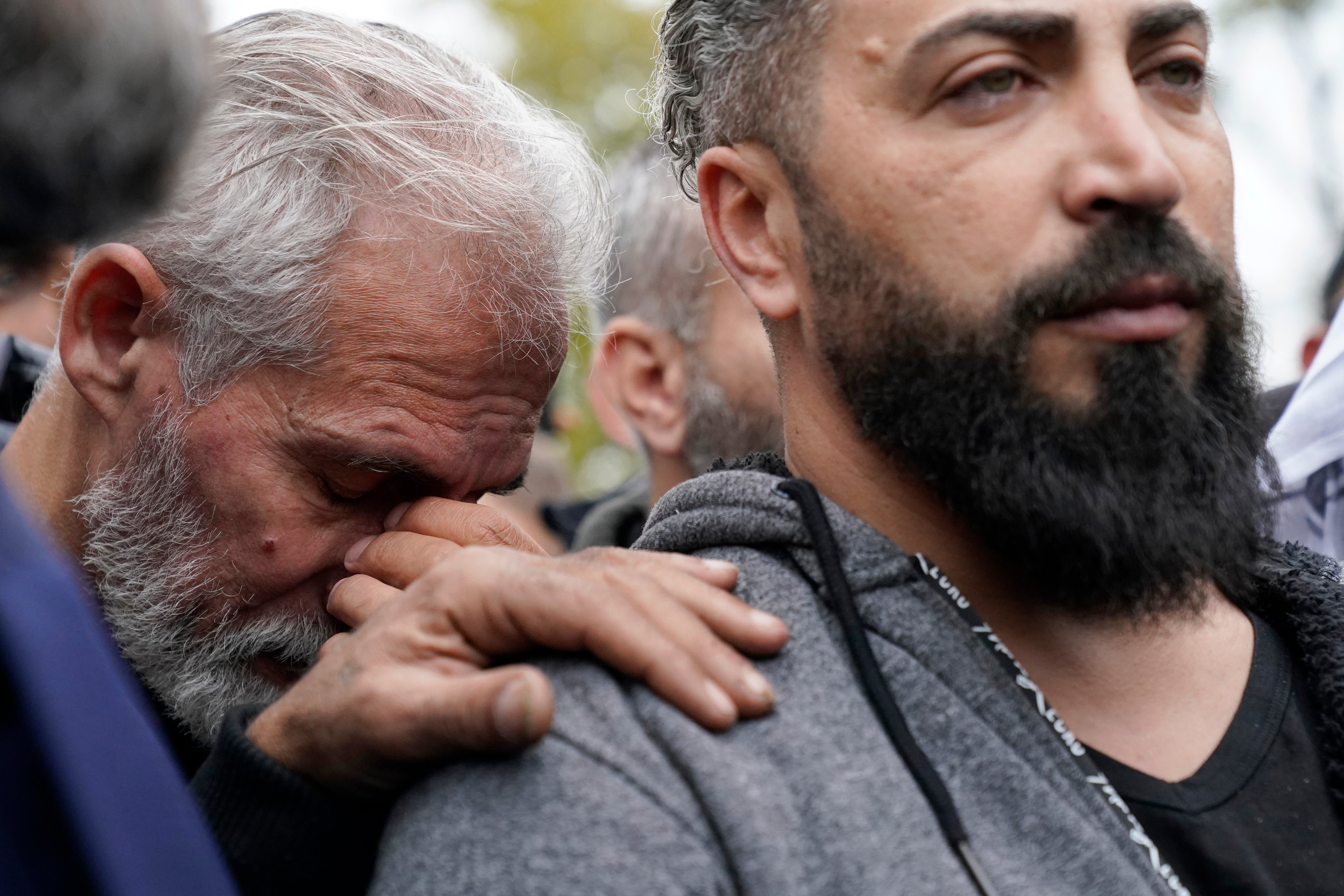 People mourn following the fatal stabbing of six-year-old Wadea Al-Fayoume