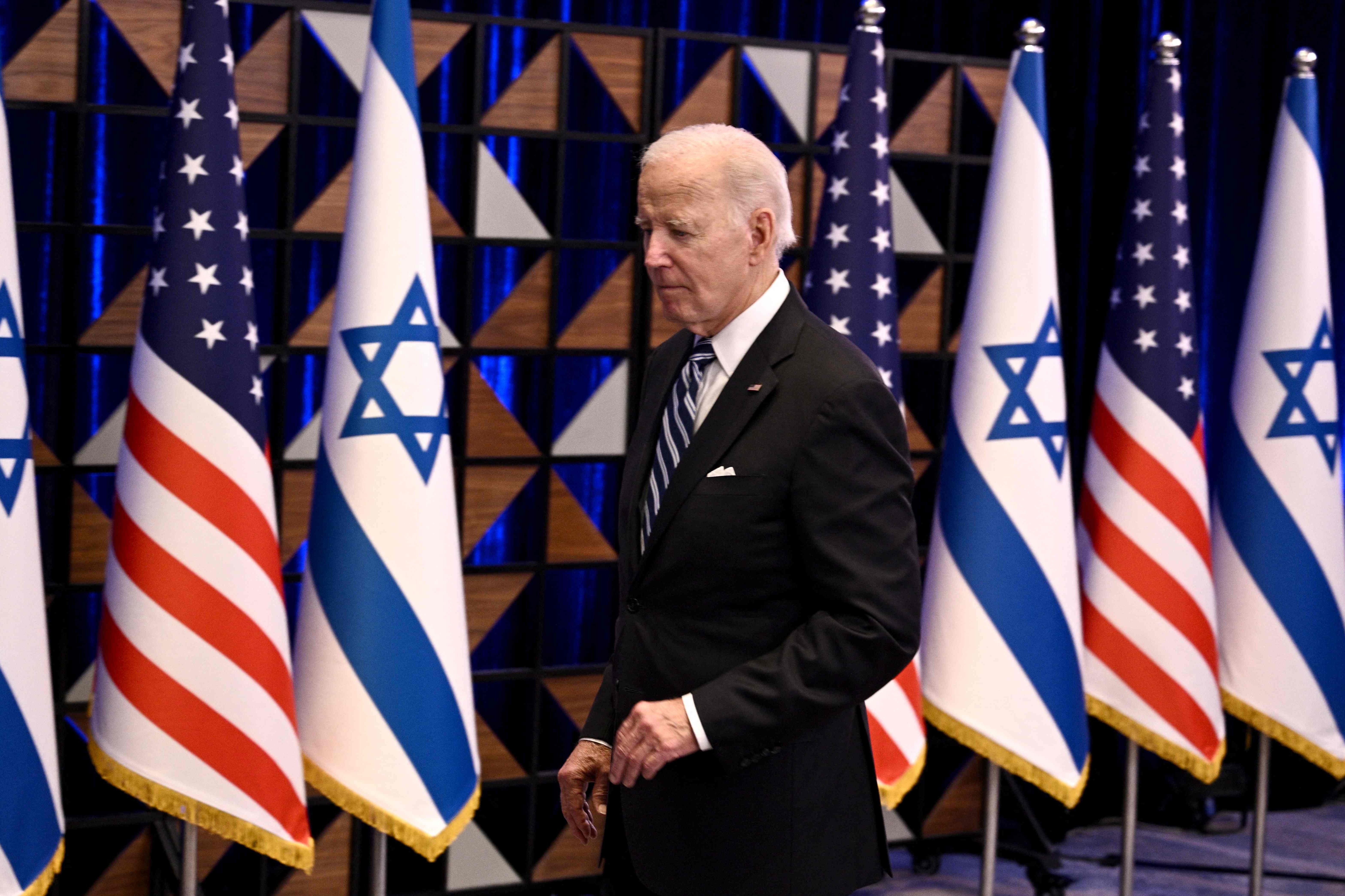 US President Joe Biden leaves the room at the end of a press conference following a solidarity visit to Israel