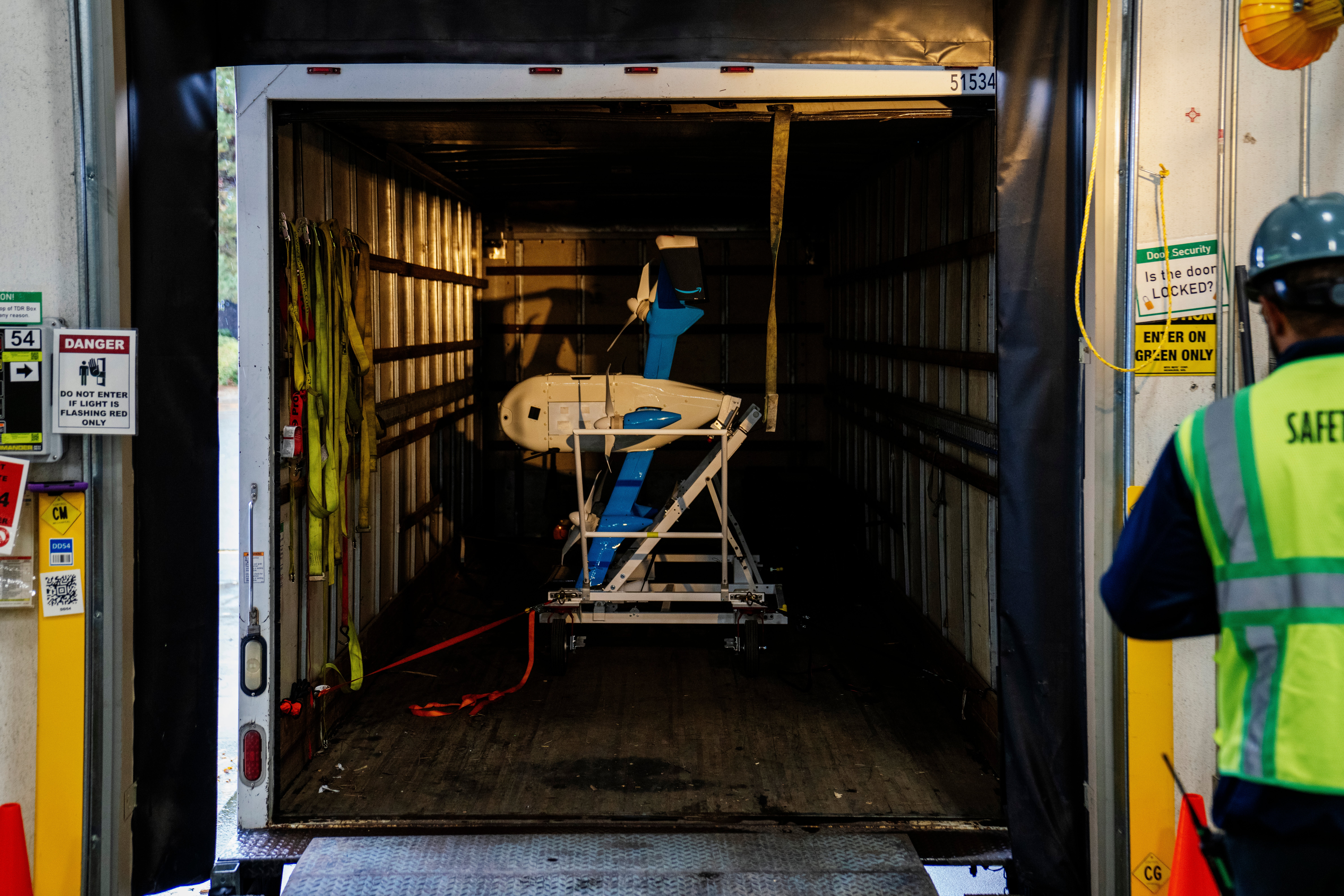 The new MK30 Prime Air drone is seen in a truck at a loading bay at the BFI1 Amazon Fulfillment Center in Sumner, Washington