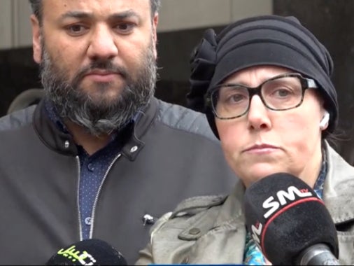 Lisa and Yahya Alarayshi speak with reporters outside of a federal courthouse in Michigan. Civil rights groups have sued the US government on their behalf, alleging agencies haven’t done enough to rescue their family members, Palestinian-American US citizens trapped in Gaza.