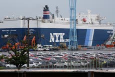 Japan's exports rise and imports decline in September as auto shipments to US and Europe climb