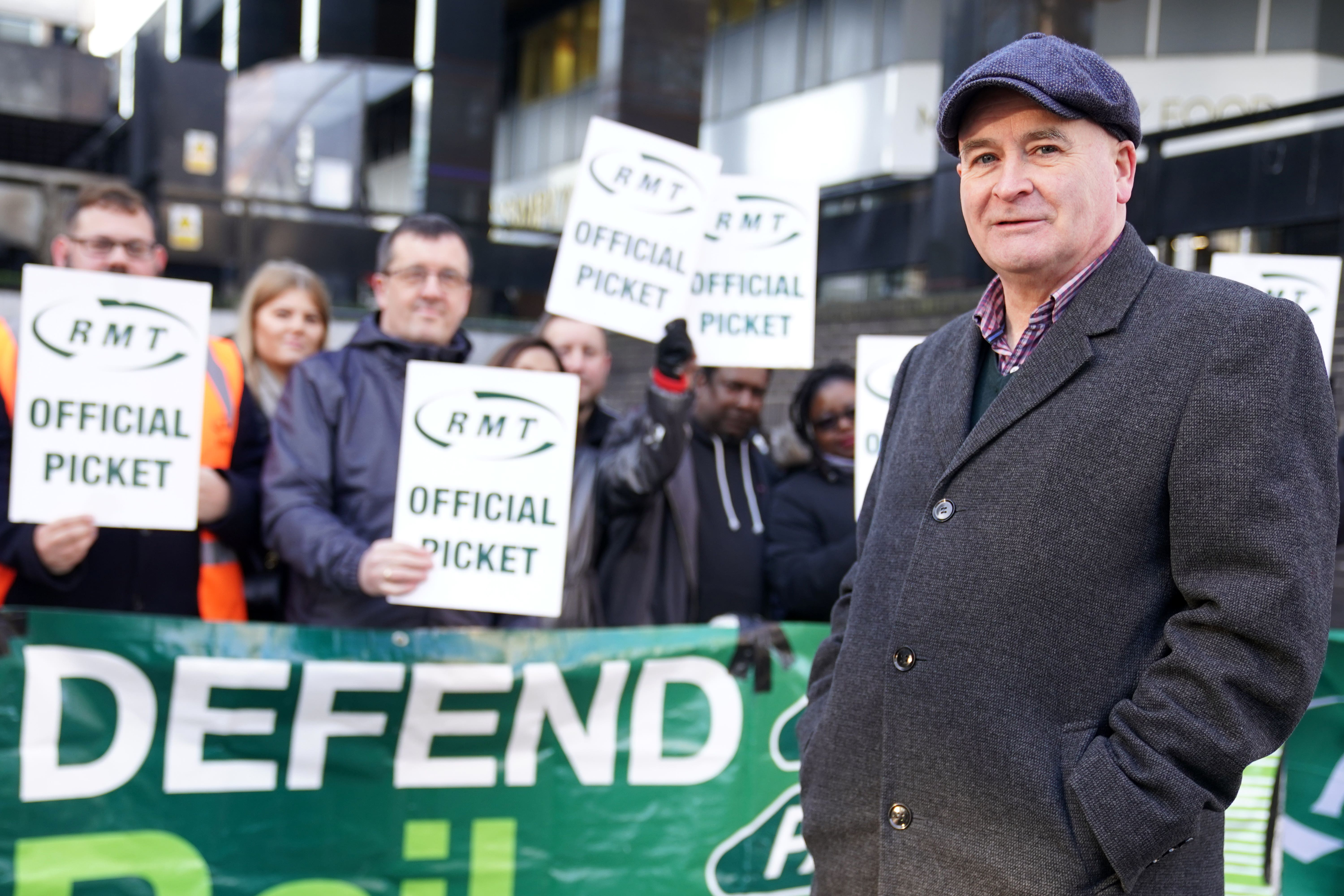 File photo: Mick Lynch, general secretary of the RMT Union joins members on the picket line