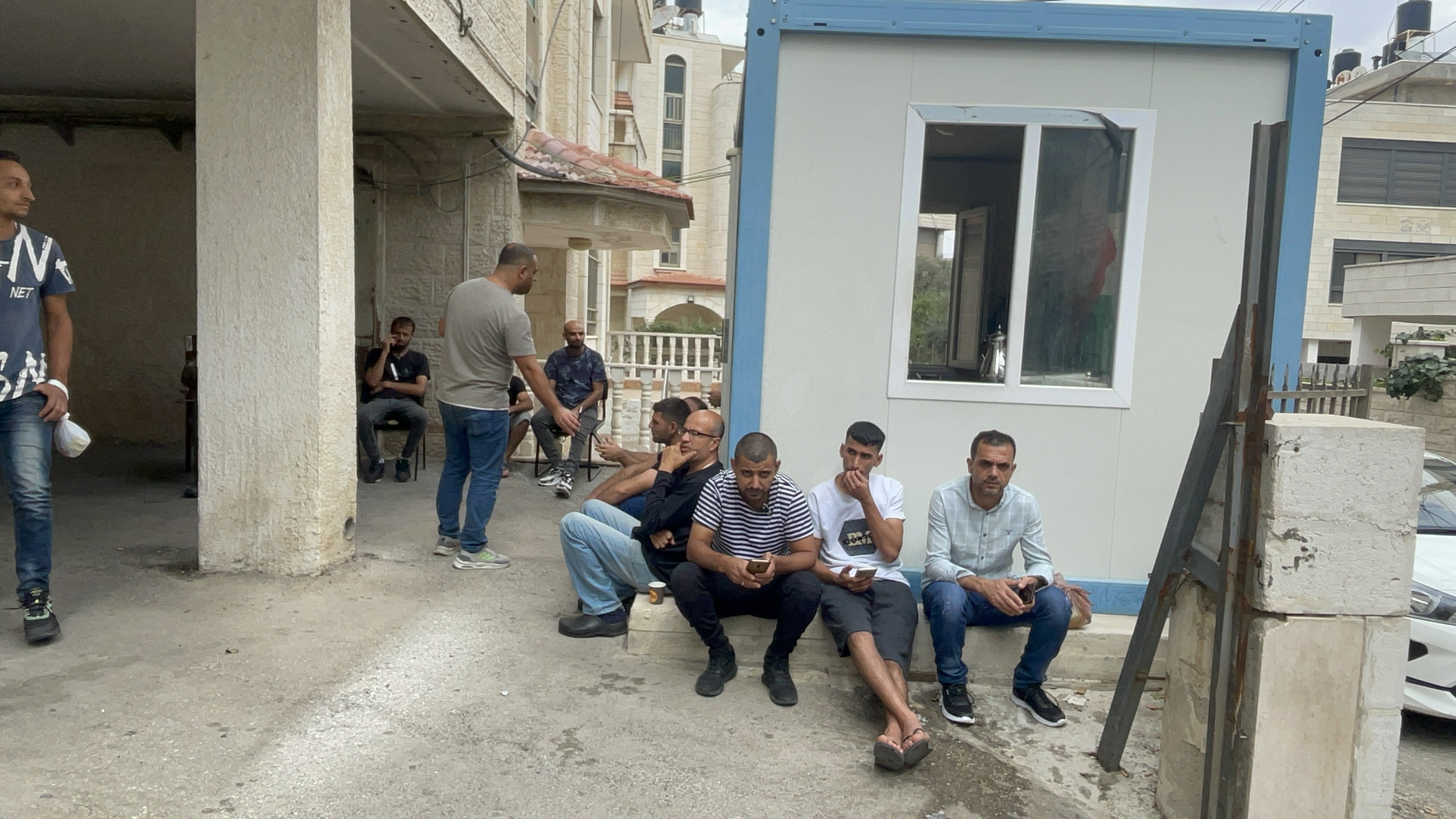 Gazan workers in Ramallah, West Bank, after being deported by Israeli authorities two days after the Hamas attacks