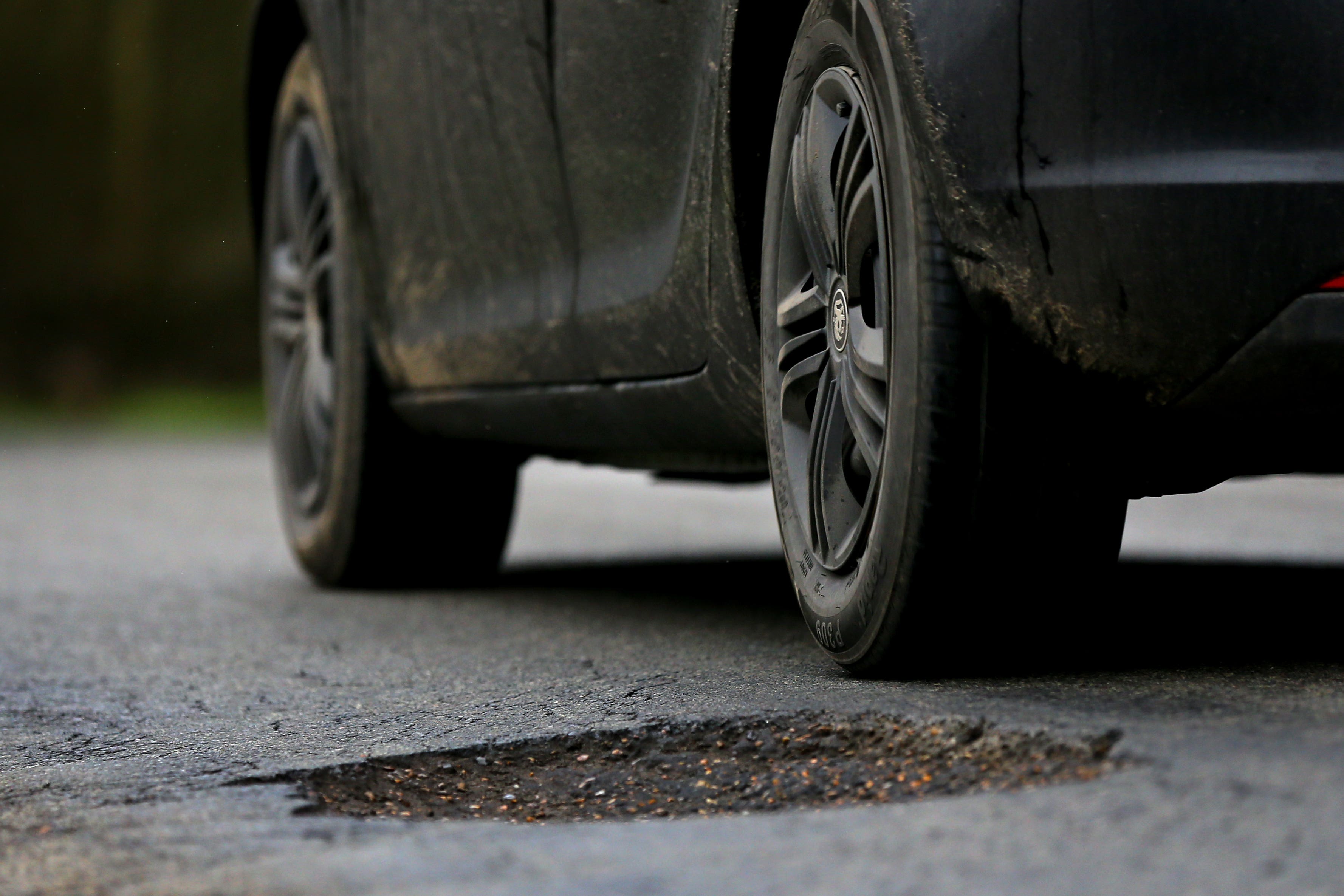 Drivers’ anger at the condition of local roads has reached an eight-year high, with a third of drivers swerving to avoid a pothole, a new survey suggests (PA)