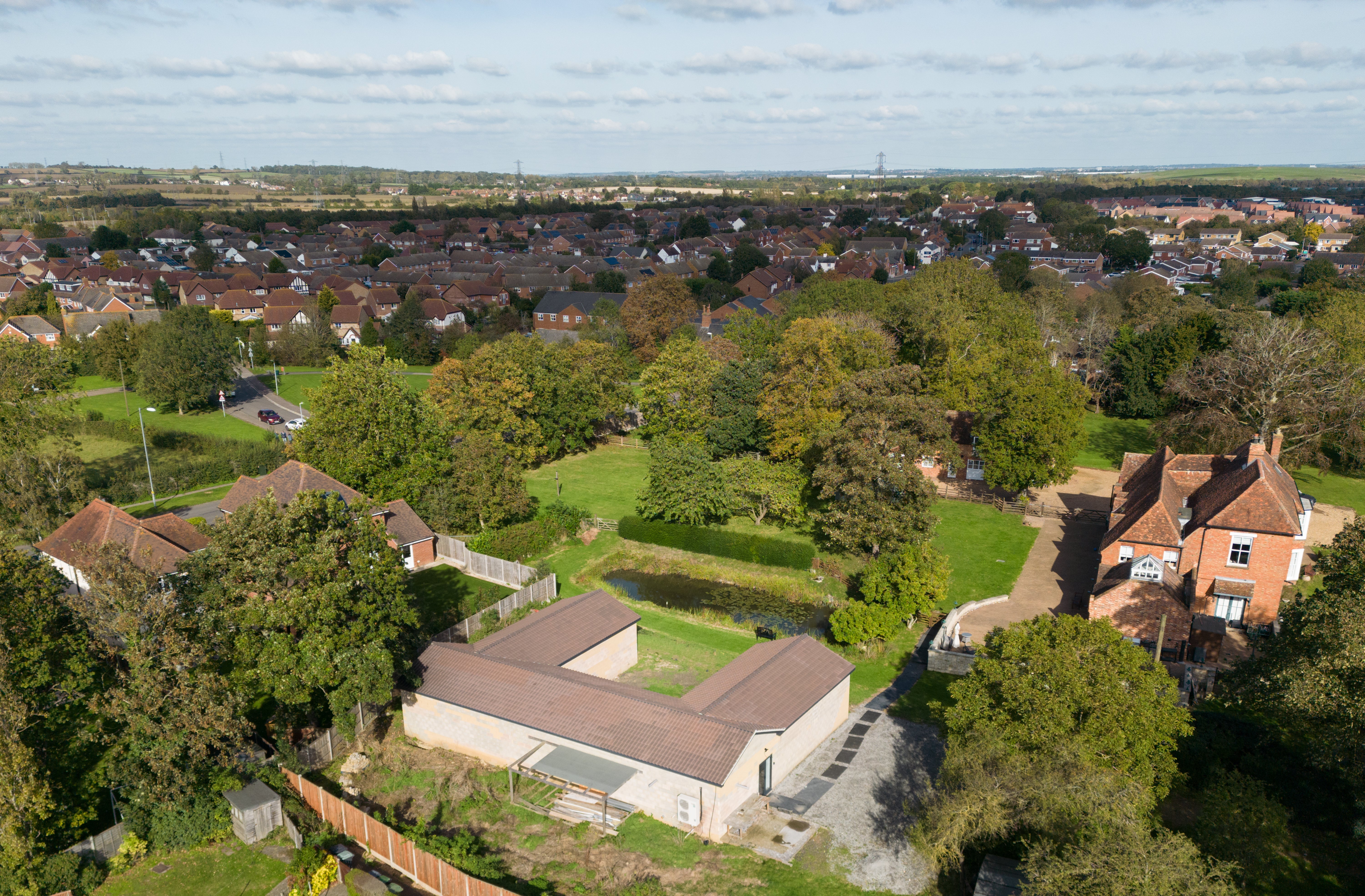 A L-shaped building was given consent - but an extra wing was added to include a spa in the garden