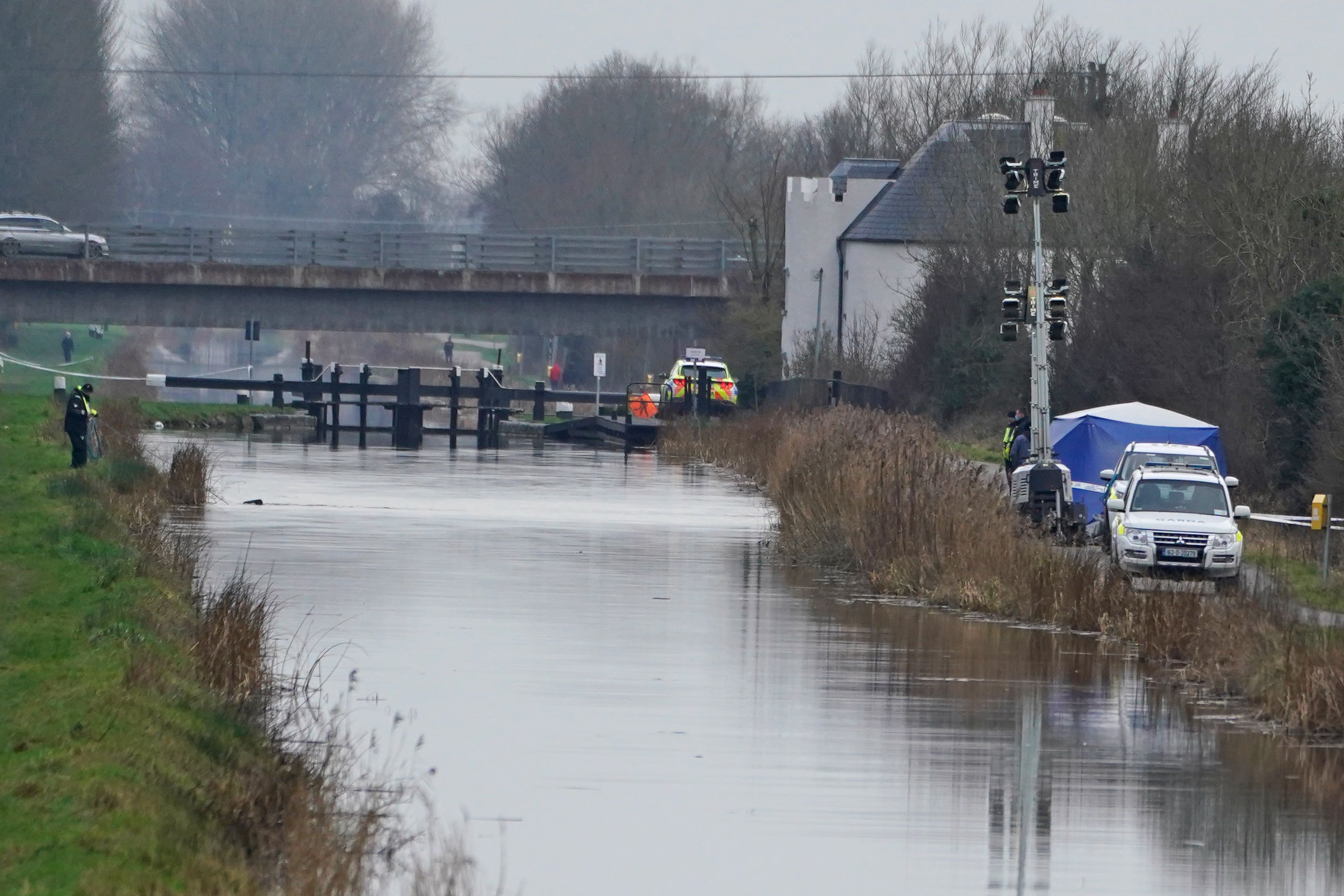 Gardai at the Grand Canal at Cappincur, Co Offaly (PA)