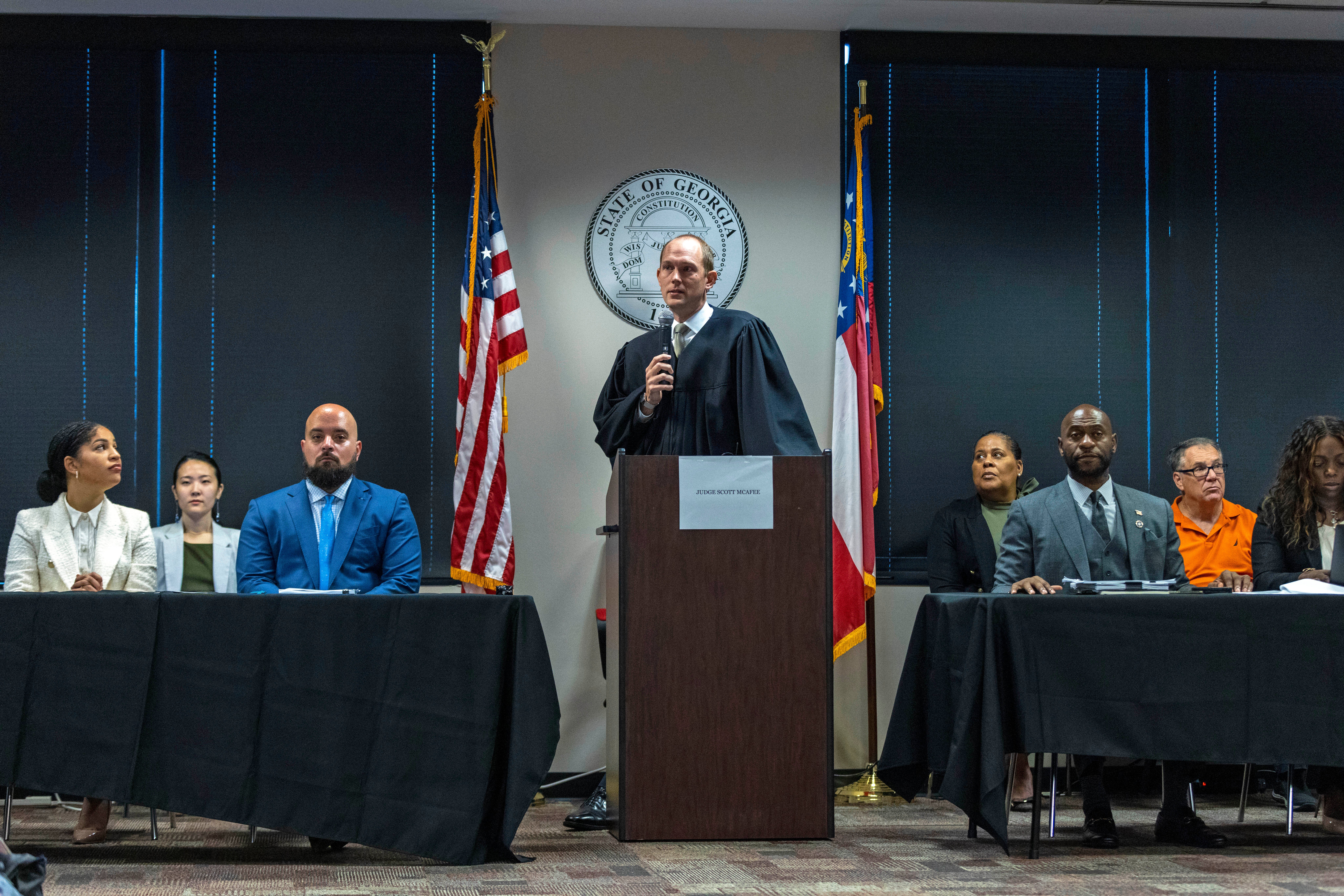 Fulton County Superior Court Judge Scott McAfee addresses potential jurors moments before Kenneth Chesebro reached a plea deal with prosecutors on 20 October.